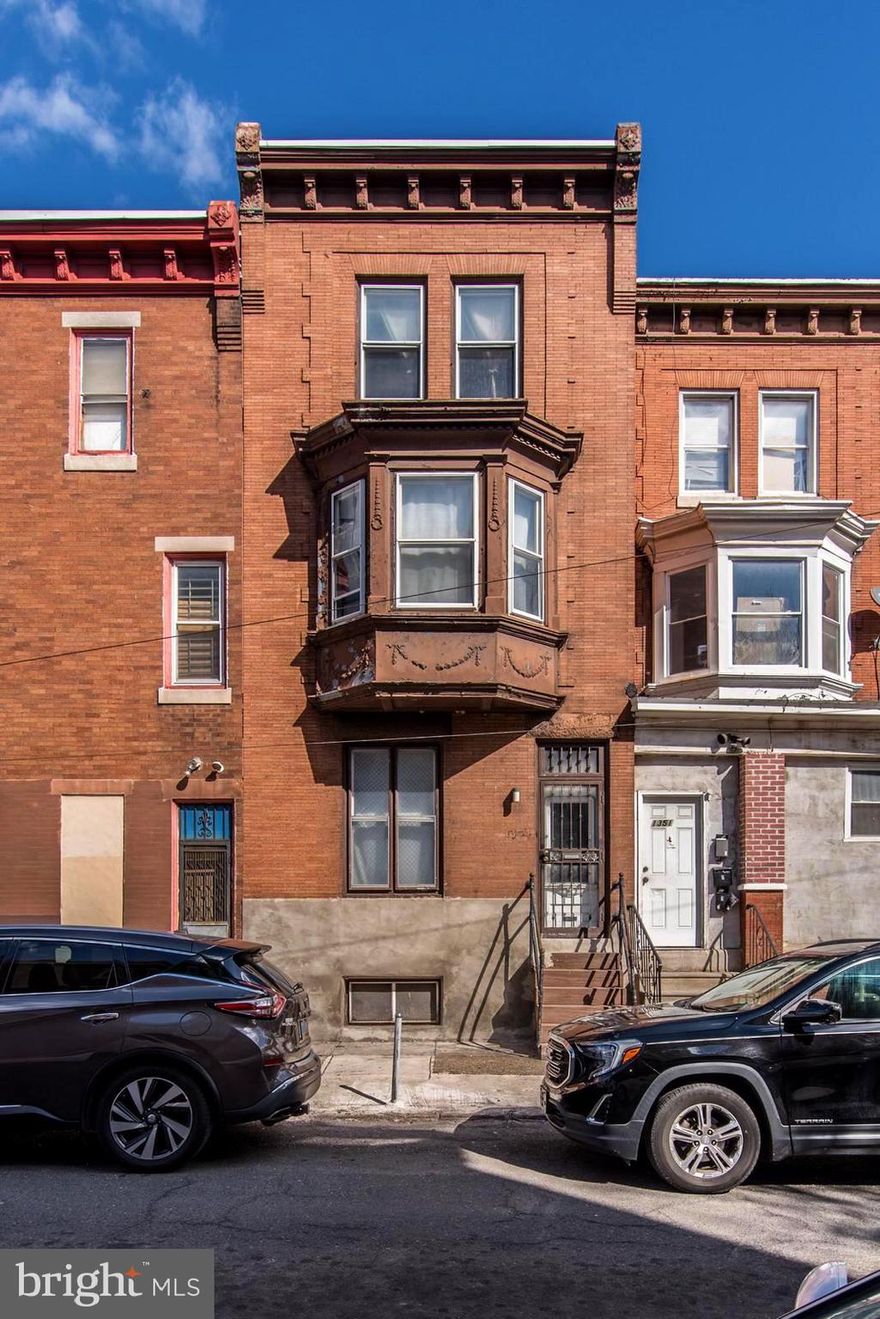 (BUYERS CAN GET A LOWER INTEREST RATE OR CLOSING CREDIT, DETAILS BELOW)
Excellent & rare opportunity awaits for this massive 3 story almost 2000sqft 6 bedroom 2 full bath property with high ceilings,  original 5 panel wood doors & decorative wood window/door trim, ideally located just minutes from Downtown Center City & Temple University, and steps to Broad St & Roosevelt Blvd. Great curb appeal featuring solid brick facade w/ attractive cornice molding, and property runs street-to-street! With updated kitchen, bathrooms & 1st floor flooring this property is in great condition with great bones, a little paint is all that's needed to make this property really shine, and with the 6 bedrooms at this price point the possibilities are endless and can accommodate any large family/families, or even as an investment for a  rooming house, section 8 ($2683 monthly!) etc! Enter into tiled foyer to a large formal living room & dining room w/ updated & durable LVT wood flooring, huge eat-in kitchen featuring updated wood cabinetry & modern range hood, with exit to the rear yard  & convenient 2nd entrance & extra street parking. The full basement is bone dry and in very good condition making it great for either storage or extra living space. The 2nd & 3rd floors features 3 large bedrooms and a full bath on each floor!
Hurry, properties this size in this condition and at this price point don't come around often.

***This property qualifies for a seller credit up to $1,600 (Sales price up to 160k or 1.6k) towards buyer;s closing costs or interest rate buydowns. Buyer is not obligated to use Brian Grike of Cross Country Mortgage to have offer accepted however must use Brian Grike to qualify for the credit. Call for details - Restrictions apply. NMLS327832, 2013300,3029***