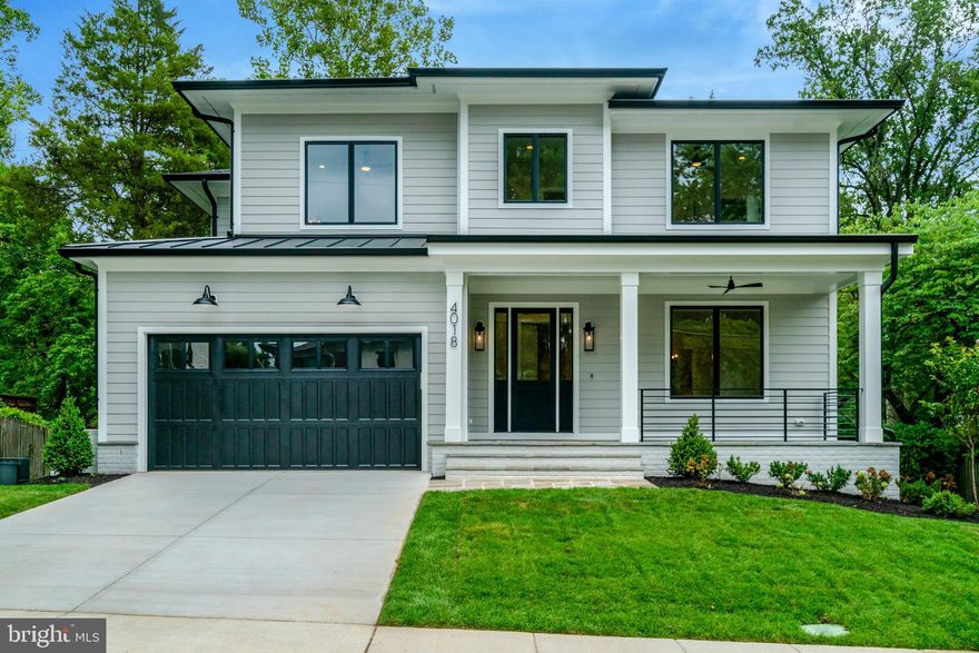 Luxury living defined at 4018 26th St N, a new handcrafted masterpiece by the popular MR Custom Homes. This exceptional craftsman-style residence seamlessly combines modern elegance with luxurious finishes. Set on a sunny, flat 10,000 sq ft lot in the coveted Dover Balmoral Riverwood neighborhood, it’s minutes away from Potomac Overlook Park, GW Parkway and Washington, D.C and is within school boundaries for Taylor, Dorothy Hamm and Yorktown.

Showcasing 7 bedrooms, 6 full bathrooms, 1 half bathroom and 6,069 sqft, this stunning home features 10-foot ceilings on the main level, 7” white oak hardwood flooring, wainscoting, high end fixtures, stylish tile finishes, and an abundance of windows that bathe the space in natural light. 
The main floor includes a living room with barn doors, a main-level bedroom with an en-suite bathroom, a dining room, a butler’s pantry with a wine fridge, a mudroom with custom cubbies, and a powder room. At the heart of the home is a coveted gourmet kitchen, featuring custom inset maple cabinetry, a spacious breakfast bar, thick Quartz countertops, and top-of-the-line appliances, including a Wolf gas range, a Sub-Zero refrigerator, a Wolf microwave, and 2 Asko dishwashers. The family room, centers around a gas fireplace, connects to the casual breakfast room and kitchen. It also opens to a heated screened porch that extends to the tranquil backyard.

The upper-level primary bedroom impresses with custom tray ceilings, built-in speakers, two walk-in closets, and a luxurious en-suite bathroom featuring a standalone soaking tub, heated flooring, a designer-tiled shower, dual sink vanity, and a private commode. The upper level also includes 2 bedrooms with en-suite bathrooms, 2 bedrooms sharing a well-appointed adjoining bathroom, and a laundry room equipped with a sink, cabinets, and a hanging rod.

The finished basement offers an expansive recreation room, wet bar with a beverage refrigerator, home gym, theater area, bedroom, and full bathroom.

Additional features include a 2-car garage, flagstone front porch and walkway, solid core interior doors, Anderson windows, professionally landscaped yard with a sprinkler system, a ProLine XE 75-gallon gas water heater, built-in speakers, CAT6 wiring, EV charger, and custom-built closet shelving throughout. Rest assured knowing this home comes with a comprehensive builder warranty.