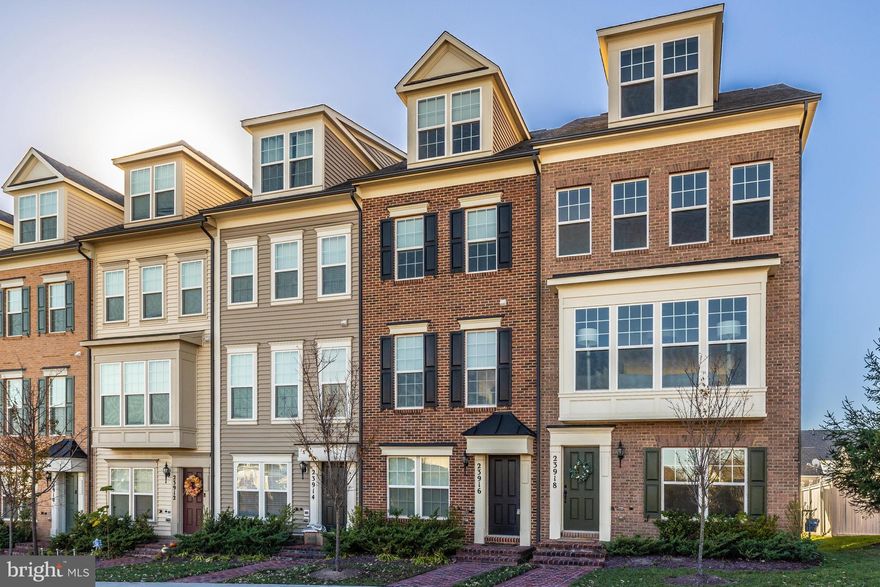 Located in the heart of Clarksburg Town Center, this recently built Miller & Smith townhome offers everything you're looking for in a home. With three bright bedrooms, three and a half baths, and a stunning gourmet kitchen, this house has everything you need to feel right at home—and then some! Featuring hardwood floors and granite countertops throughout, ceramic tile in the bathrooms, and more upgrades than we can list here (seriously), this is the perfect place to call yours. And it doesn't stop there: The one-car garage and covered carport are large enough to fit two vehicles comfortably, while the deck provides a beautiful view of Sugar Loaf Mountain, space for entertaining or relaxing outside with friends and family. Plus, you'll be close to I270, schools, Clarksburg Outlets, and community amenities like the pool, gym, and parks so they're never out of reach! Don't miss what this beautiful home is all about, Schedule your tour today!