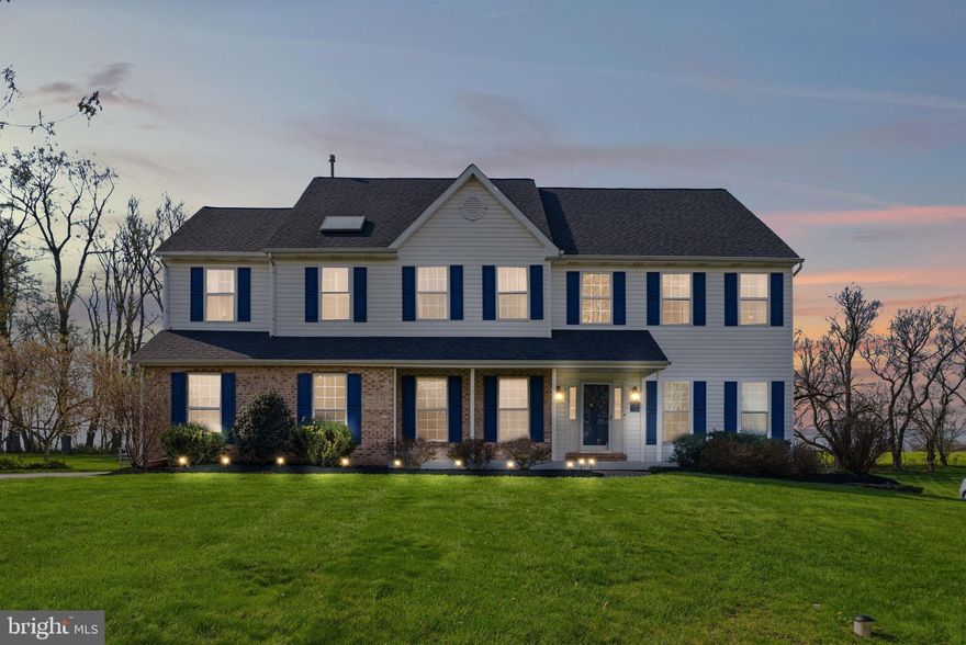 New to the market, this exceptional estate-style Colonial in Collegeville showcases true pride of ownership throughout. Offering over 3,000 sq ft of beautifully upgraded living space, the home is ideally situated on nearly an acre backing to preserved open land. A paver walkway leads to the extended front porch and into a dramatic two-story foyer. The main level features hardwood flooring throughout, along with elegant crown molding, wainscoting, and refined finishes. To the right of the entry, the living room sits across from a private office with double glass French doors, which could also serve as a first-floor bedroom and is conveniently located near an updated powder room. Continuing through the main level, the home opens into a spacious dining room positioned adjacent to the kitchen, creating an ideal flow for entertaining. The fully renovated kitchen is a true centerpiece, featuring a large island, double ovens, custom built-in cabinetry with wine cooler, an expansive pantry, and a window overlooking the flat, private backyard—perfect for a future pool. Just off the kitchen, the extended, low-maintenance screened-in deck provides seamless indoor-outdoor living and is ideal for year-round enjoyment. The impressive two-story family room is filled with natural light and anchored by a marble gas fireplace, offering a warm and elegant space for everyday living and entertaining. Upstairs, the expansive primary suite provides a private retreat with a sitting area ideal for a home office or fitness space, a custom walk-in closet with built-ins, and a luxurious fully updated bath featuring skylights. Three additional generously sized bedrooms and an updated hall bath complete the second level. Dual front and rear staircases add both elegance and functionality. Additional highlights include a finished basement, new windows, ceiling fans throughout, water softener, new carpet, tinted windows for added protection, and a laundry/mudroom with utility tub and direct garage access. The oversized two-car garage and front porch feature durable epoxy-coated flooring, while the front porch offers the perfect setting to enjoy sunset views. Located in the highly desirable Silver Leaf Farms community, this home is nestled in a quiet cul-de-sac neighborhood with sidewalks and street lighting, within the award-winning Perkiomen Valley School District. Conveniently located just minutes from major highways, shopping, and fine dining.