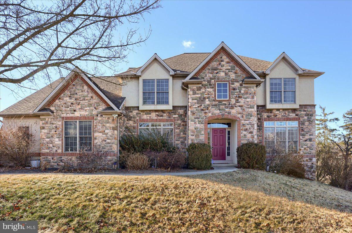 Beautiful custom built home with lots of hardwood and a gorgeous kitchen. Very spacious with 5 bedrooms, 3 full baths and a powder room. Kitchen features granite counter tops, an island and upgraded, timeless cabinets. Kitchen also features a 6 burner gas stove and double oven. Family room with gas fireplace and a formal dining room. Upstairs features a huge primary suite with lots of space in the primary bath and walk-in closet. The other four bedrooms share two jack and jill bathrooms. Finished basement with a family room and workout room. There are 2 furnaces; one for upstairs and one for downstairs. Exterior features a deck and a relaxing patio with gazebo. This is a lot of home for the money.