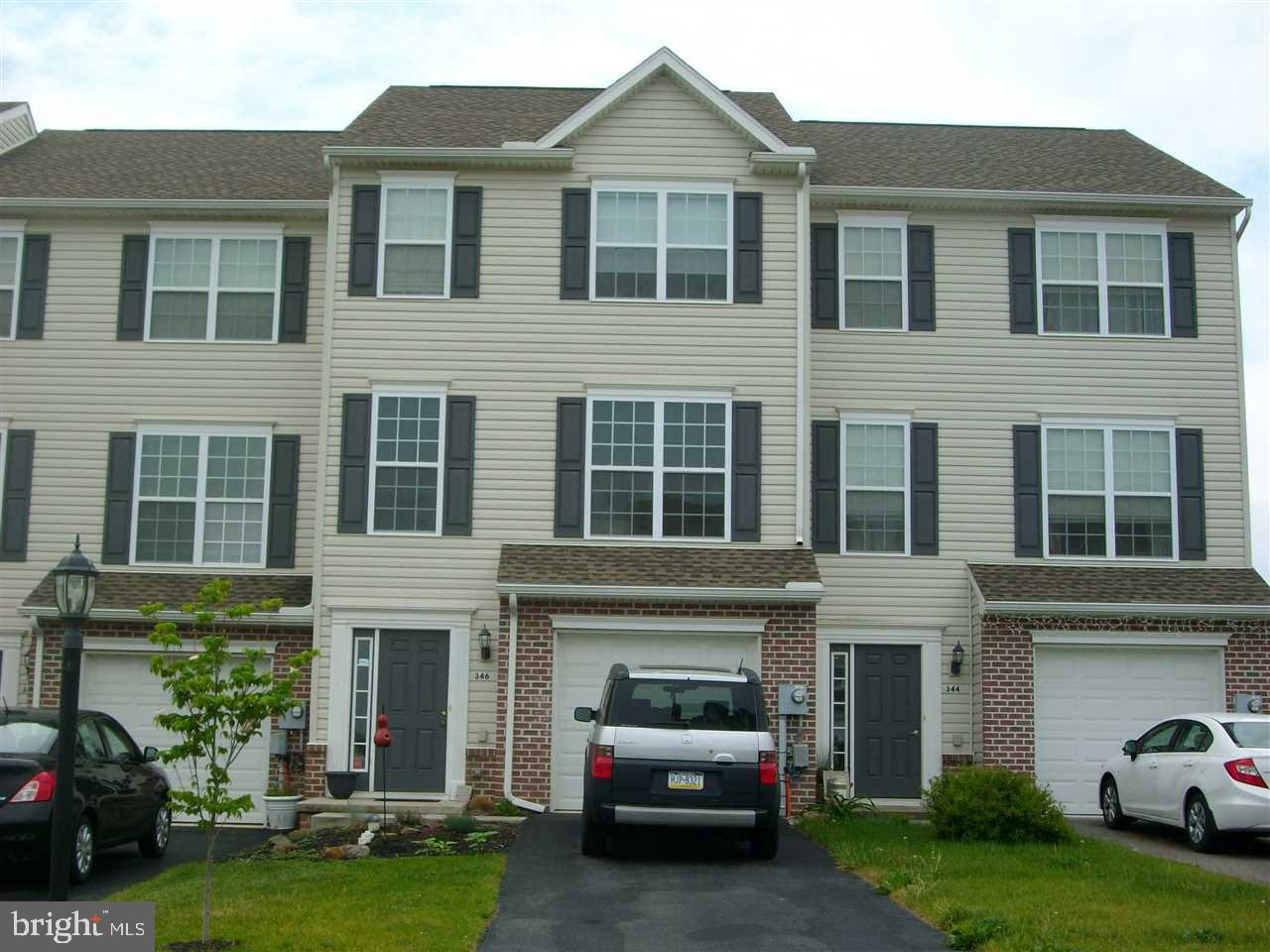 Move right in this Like New Gorgeous 3 Bedroom 2 1/2 Bath Townhouse! Well Appointed Kitchen with Laundry/pantry, Newer Appliances include Refrigerator, Smooth Top Range, Microwave, Dishwasher, Washer & Dryer! 9ft Ceilings on Main Floor*Tastefully Painted*Affordable Gas Heat & Central Air*Enjoy the View from the Deck* Garage & Basement for more space and storage!