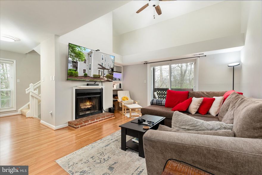 Charming and private condo in the heart of Oakton! Ideally located close to the Metro, shopping, dining, and everyday conveniences. This beautifully maintained 2-bedroom, 2-bath home features an open-concept layout filled with natural light.

The main level offers a bright and airy living space with a cozy wood-burning fireplace, a spacious dining area, and a galley-style kitchen with a pass-through to a counter-height bar — perfect for entertaining. The vaulted ceiling in the family room enhances the open feel, leading to an oversized balcony ideal for relaxing with your morning coffee or unwinding in the evening.

Down the hall, you’ll find a generously sized laundry room, a full bath, and a secondary bedroom with peaceful wooded views. A versatile landing area on the way to the upper level provides the perfect space for a home office, craft, or hobby station.

Upstairs, enjoy a spacious loft-style primary suite offering privacy and comfort, complete with a walk-in closet and a full en-suite bath.

The condo includes two parking spaces, ample guest parking, and access to wonderful community amenities. Schedule your tour today!