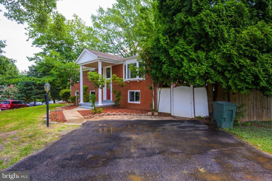 Beautifully renovated. Light filled and completely updated Kitchen with SS appliances, New Roof, Completely updated 3 Full Baths, Hardwood Floor throughout the main level and stairs, spacious Lower Level also has new carpet, and opens to a lovely rear 2 tier deck. **Sold as is.