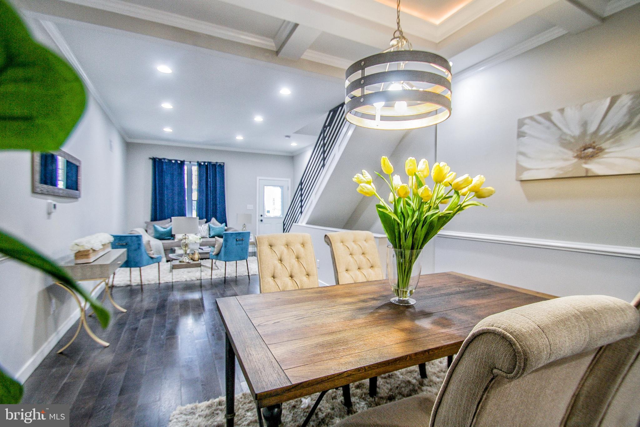 Huge Price Reduction....What an amazing find, this exquisite Town home, located in the highly desirable Cedar Park neighborhood of Philadelphia, is looking for a new owner. Having just undergone a complete renovation it now features a fabulous open floor plan, an abundance of hardwood floors that flow throughout the entire first floor, 9 ft high ceilings, recessed lighting  with crown molding and a outstanding coffer ceiling design. This 3 bedroom, 3-bathroom home has an amazing gourmet kitchen with stylish white shaker 42" soft close cabinets ideally paired with gorgeous  Carrera River quartz counter tops,  ceramic tiled back splash and all new stainless-steel appliances. The second floor offers a master bedroom suite ensemble with its private full bathroom and great closet space, 2 additional bedrooms, and a hall bathroom. As an added bonus, this home offers a private, fenced-in rear yard and a fully finished basement. All mechanical systems have been updated including a new HVAC system, a new 40-gallon hot water tank, a new electrical panel, all new plumbing and the roof has been overhauled and certified. Don't delay, schedule an appointment today and make this delightful house your home! Disclosure: The seller is a PA Licensed Real Estate Associate Broker.