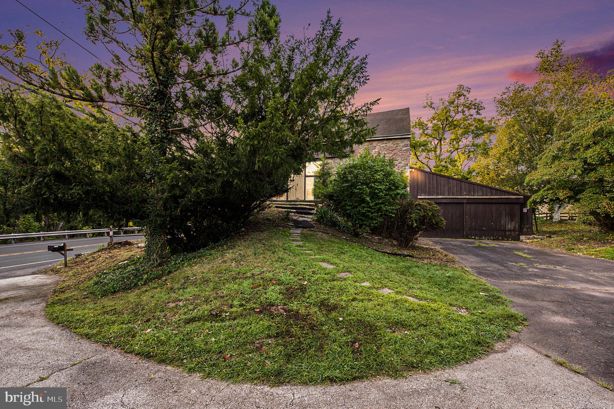 A Diamond in the Rough Awaits Your Vision!
-
This one-of-a-kind barn-to-dwelling conversion offers character, expansive space, and incredible potential. Originally crafted with quality workmanship and materials of the time, the home features soaring ceilings, open floor plan, exposed stone walls, tile and brick flooring, and timeless post-and-beam construction.
-
A large outbuilding/barn on a concrete slab is also included—ideal for storage, workshop, or creative reimagining—though it does require repair.
-
Prime Location: Close to Perkiomen Creek & Trail, Evansburg State Park, Green Lane Park, charming Skippack Village, major commuter routes, and shopping in Collegeville, including the outlets.
-
Please note: this is an estate sale, and the seller is unable to complete a Seller’s Property Disclosure. The buyer will be responsible for all Perkiomen Township U&O applications, inspections, and requirements. The HVAC system is believed to have been installed in 2016 (buyer should verify). one-year AHS Home Warranty will be provided at no cost to the buyer.
-
Square footage and lot size are based on a prior appraisal, public records, and the deed. Please note: the deed reflects a significantly larger lot size than public records indicate. The smaller public record lot size is what is used in this listing. Creek frontage is estimated. Buyers and agents are encouraged to verify both dwelling size and lot dimensions for their own satisfaction.
-
*Please use caution on the exterior steps, as the Belgian blocks and wood accents have settled, some are loose, and are uneven. Please bring flashlight as it may be dark in the lower level.
-
Please be sure to explore all the photos, floor plan, drone fly-through, property website, photo gallery, and 3D virtual tour. Then schedule a showing with your agent!