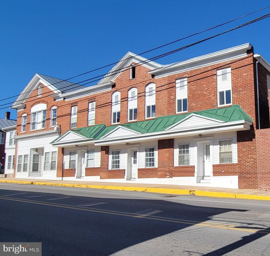 Hard to find gem in Page county.  Commerically zoned building with 10 well maintained rental units, ( 4 two brs and 6 one brs) and parking.  The owner has updated and improved many units during tenure.  Room for increasing rental rates due to lack of inventory. All tenants pay for their utilities including water/sewer. Building is located in heart of town of Stanley steps to bank Post office, library, and close to shopping. Lots include 71A5-A-76,77, 78,79 & 80