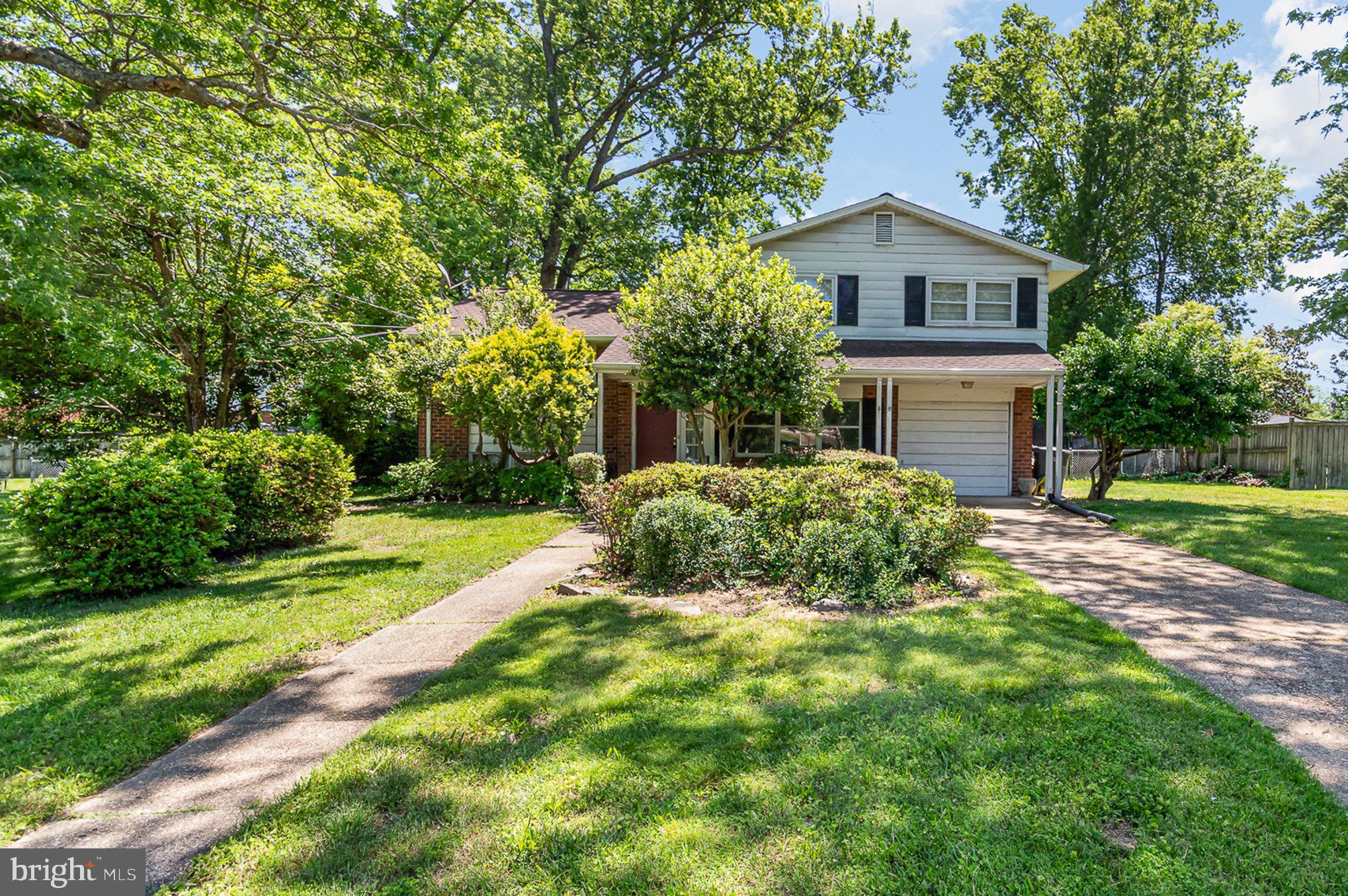 Come with your vision for this sought after location! Decide how you want the look. Discover the perfect blend of space, comfort, and location in this well-maintained split-level single-family home featuring 4 bedrooms and 2 bathrooms, plus a walk-up basement and a 1-car attached garage.
The main level offers a functional layout with a bedroom and full bath, a bright living room, dining area, and a recently updated kitchen with new countertops. Upstairs, you’ll find three additional bedrooms and a full bath. The lower level includes a walk-up basement with a convenient half bath, ideal for added living space, a home office, or a recreation room.
Recent updates include new tile flooring in the family room and garage, as well as a converted powder room with stylish wall tile, now a full bath. The home features a mix of hardwood floors, tile, and carpet throughout.
Enjoy the ease of the split-level design with minimal stairs and a superb location just minutes from DC and Maryland. With the Huntington Metro stop right outside your door, commuting is a breeze. You’re also just minutes from the Potomac River, Mount Vernon, the DC Wharf, National Harbor, and countless trails, restaurants, and entertainment options.
Don’t miss this opportunity to live in a spacious, updated home in one of the most accessible and vibrant areas of the region!