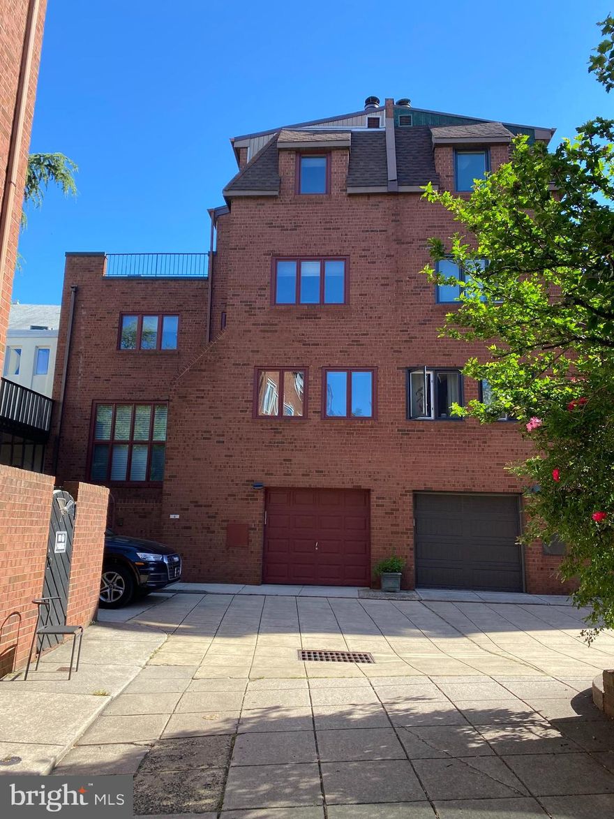 Seller financing available at an attractive rate.   Please call for details.  Looking for Location, Space and Garage Parking?  This May Be It!  Welcome to 127 Catharine Street -Located in the Blue-Ribbon Award-Winning William M Meredith School Catchment and tucked away in a Quiet and Private Landscaped Courtyard just off one of Queen Village's most sought after Tree Lined Blocks.   This Dramatic 3 Bedroom plus Den, 2.5 Bath Home has Tons of Natural Light, Expansive Windows, High Ceilings, Spacious Rooms, Solid Oak Hardwood Floors throughout, 2 Wood Burning Fireplaces, Private Garden, Beautiful Roof Top Deck and YES- Convenient Garage Parking. 1st Floor:  Enter this Beautiful Home through the Side Garden Area or Garage into a 2 Story Foyer area with Floor to Ceiling Windows and Exposed Brick leading directly to a Wonderful Living Room Drenched with Southern Exposure from Massive Windows and Soaring Ceilings plus a Corner Wood Burning Fireplace.  A few steps up Introduces you to the Fabulous Dining Room and Kitchen Area.  The Dining Room has Wonderful Southern Exposure and Natural Light and overlooks the Private Garden Area.  There is a Fabulous Side Buffet Area with lots of Cabinet Space, Granite Countertops, Wine Rack and sits just off of the Fabulous & Very Functional Kitchen with 42 inch Solid Wood Cabinets, Granite Countertops, Undercounter lighting and all Stainless Steel Handsome Bosch Appliances.  Next Level:  2 Fabulous Light filled Bedrooms.  The Front Bedroom has Wonderful Views of The Historic Shot Tower, Hardwood Floors and Large Closet. The 2nd Bedroom is Nice Size with Hardwood Floors and Double Closets.  The Hall area has a Full Bath and Separate Laundry Room with Front Loading Washer/Dryer with Cabinets above.  Top Level:  Private Master Suite with Windows Surround, Wood Burning Fireplace, Walk in Closet/Dressing area and a Full Bath.  Just off the Master Suite is a Beautiful Open and Airy Deck surrounded by Wonderful Mature Trees and Lots of great Views including the Center City Skyline. Lower Level:  Den/Sitting Room/Work-From-Home Office with an Entire Wall of Custom Built in Bookshelves and a Side Powder Room.  A Great House in the Best neighborhood close to many Restaurants, Cafes, Parks, Playgrounds, Public Transportation, Highways and Bridges.  The Unique Courtyard itself Provides a Safe, Enclosed Area for Children to Play Outside. Need a 2nd Parking Space? No Problem - just a Stone Throw Away at the Queen Village Parking Lot.   Easy to Show.  This property is also available For SALE.