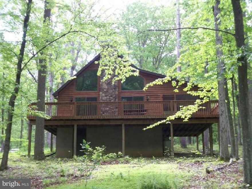 River Country!  Cedar Chalet, Quality construction thru-out, Hardwood floors, gas fireplace with stone hearth and chimney, too many amenities to list. 3 BR, 2 BA on 2 acres with river access. Enjoy the sights and sounds of nature. The Cacapon River goes on for miles, river trips can last for several days so make this your base camp. Seller says "Bring all offers " making this a must see property!