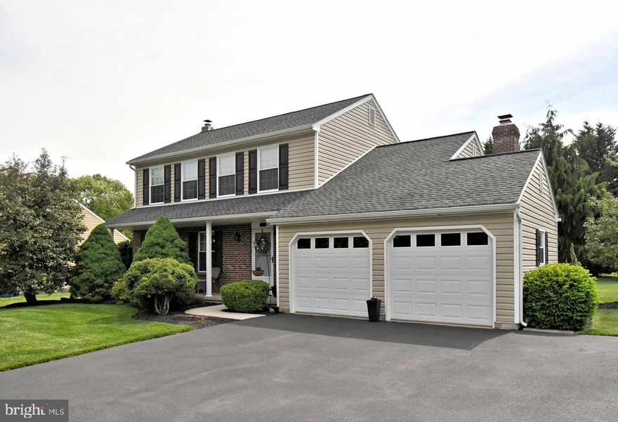 This Canterbury Woods Colonial is truly HOME! A beautifully maintained, upgraded, and customized home just waiting for new owners to create their own memories.
 The classic brick front offers timeless curb appeal complemented by recently updated vinyl siding and trim, a beautifully manicured lawn, mature landscaping and neatly maintained shrubs that create a warm and inviting lasting impression. The living spaces, inside & out, have been thoughtfully designed for everyday comfort. 
Hardwood flooring greets you at the front door & continues into the living and dining rooms--both rooms are neutral and ready for your decor. The eat-in kitchen has been updated with quartz counters, textured backsplash and stainless appliances.  Step down into the family room with a gorgeous stone fireplace that is sure to be your favorite, cozy retreat in the chilly winter months. Two backyard exits provide easy access to the outdoor living spaces and create a natural flow that is perfect for effortless entertaining. Your favorite living space may very well be the huge screened in porch that connects to the Trex deck. Such a great open space to enjoy the warm spring & summer breezes while relaxing in the privacy of the yard where there is plenty of room to play. Picture the newspapers on the huge table covered in fresh steamed clams right off the grill for a great summer BBQ...just fabulous living spaces all around. Head upstairs and you'll love the main bedroom with vaulted ceiling and a custom full bath. Two other nice sized bedrooms share the hall bath. Notice how wide the staircase is in this model?---ideal for moving in! Still need more room? Well, the finished basement has all that you need! A post was removed and replaced with a beam creating a much more open layout that is ideal for relaxing, entertaining or game days. The custom wet bar is perfect for Eagles games when all your favorite people stop in! This home is move in ready with major systems already updated providing both charm and peace of mind. All this in super sought after Canterbury where you can walk to Spring Valley Park and enjoy all it has to offer---walking trail, tennis courts, basketball courts, sand volleyball pit, pavilion, restrooms, soccer &
baseball fields, tot lot & fresh air. Close & convenient to 309, 463, 202, PA Turnpike, Target, Wegmans, Trader Joe's and several Septa train stations & bus stops. Take some time over the next few days to come and see this beauty. Everything has been done for you----simply move in and enjoy! 5*****