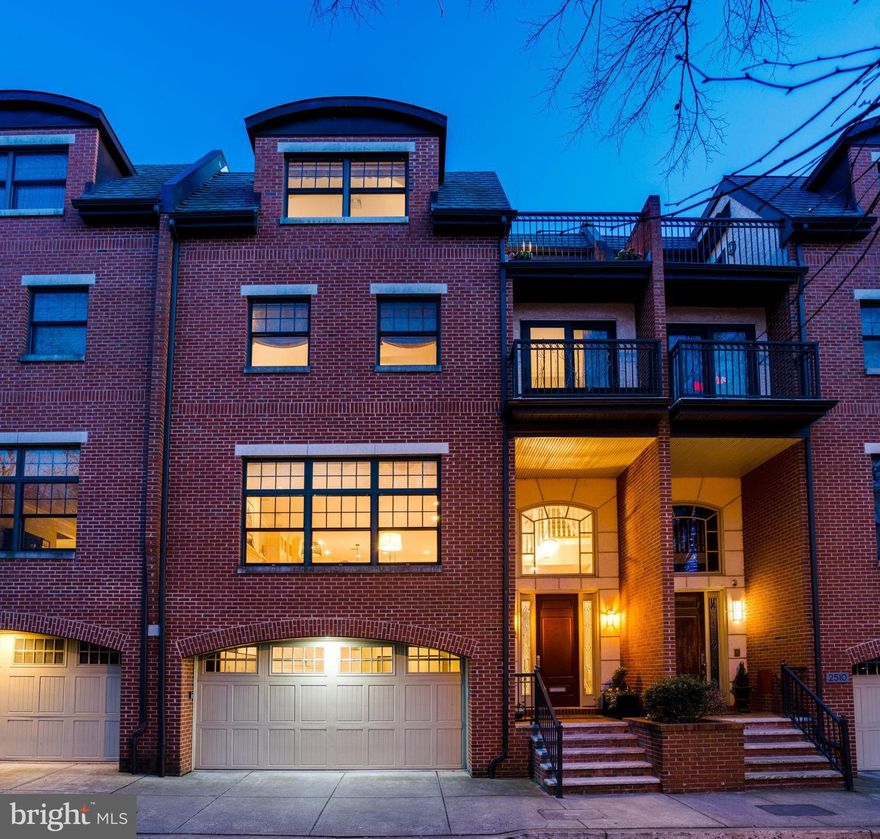 Imagine strolling down the most iconic street in all the city, a lush canopy of leafy green overhead, the tranquil sounds and captivating panoramic beauty of the park enveloping you. Breathe in the calm, and feel at peace. And then, as if it were always meant to be, you find yourself, home. Welcome to 2508 Delancey. With its understated elegance, a shining star on the most highly coveted block, this jewel property bestows all the creature comforts of suburban living in the heart of Fitler Square. A  stunning four bedroom, three bath home elevating city living with thoughtful detail.  Step inside, eyes drawn upward to a lofty two-story foyer with striking arched window. Just a few steps up to the beautiful main floor. Expansive yet cozy,  there is an immediate pull to the beautiful triple windows anchoring the Great Room, a gorgeous green park view beyond. Living, breathing artwork. The custom kitchen a stunning focal point, expertly fitted with classic white cabinetry, quartz counters, professional stainless appliances and wine fridge. Adjacent, a comfortable dining room opens to a sunlit balcony with ease of access for an herb garden, grilling steak (grill included), or enjoying morning coffee al fresco. The living room is expansive and inviting with a lovely gas fireplace and built-in shelving. Ten foot ceilings, beautiful wide-plank oak floors, and elegant crown molding accentuate this level of the home. Tucked away on the third floor a few steps up, a private, luxurious primary suite. Lined with park-view windows, this zen suite is indeed a haven. An adjoining sitting area opens to a private treetop balcony. The modern spa-like marble bath boasts a soak tub, separate vanities, oversized shower, and privacy room. Gorgeous hardwood floors and crown molding highlight, and two generous walk-in closets complete the suite. Adjacent the primary sits a comfortable bedroom easily doubling as a home office. Just a few steps up to the zenith of this magnificent home, an open flex space is central on this floor, light-filled and airy, anchored by a sunlit balcony. There are two spacious bedrooms sharing a chic marble hall bath. Both suites boast large walk-in closets and the home's beautiful oak flooring. With wonderful peaks of leafy green and chink of blue sky through its park-view windows, the northern-facing suite also leads to a private open-air terrace with a stellar skyline and park panoramic. Recalling back to the very first step inside 2508 Delancey, there is far more of this magnificent home yet to explore. Ideally situated on the home's first level, a cozy but spacious room providing key multi-purpose usage, whether home office, den, craft/play area, or home gym. Double glass sliding doors lead out to a sun-splashed private oasis.  This brick pavered patio, the fifth private outdoor space gracing 2508 Delancey, is perfect for a cocktail party, al fresco dining, or year round vegetable garden. This fabulous first floor might also be a wonderful au-pair/in-law suite, as a convenient full bath sits immediately adjacent. And finally, perhaps the ultimate in urban amenity, an oversized two-car garage w/abundant storage. Seamlessly adjoining the Schuylkill River park and boardwalk,  2508 Delancey's idyllic, park-front location ensures absolutely everything is at your disposal. On this most prestigious city block,  the neighborhood at your doorstep informs a dynamic lifestyle. Whether contemplative morning strolls through the park with your dachshund, or sunset round of tennis.  A community garden, the river trail, playgrounds, tennis/basketball courts, and perhaps the ultimate dog park in Center City.  Convenient access to University City, Boathouse Row, museums, major travel routes, and bus/train stations. An easy stroll to Rittenhouse Square, cool coffee shops, and stellar fine dining including a plethora of new neighborhood restaurants and bistros. City living, elevated. This is the one. Welcome to 2508 Delancey. Welcome Home.