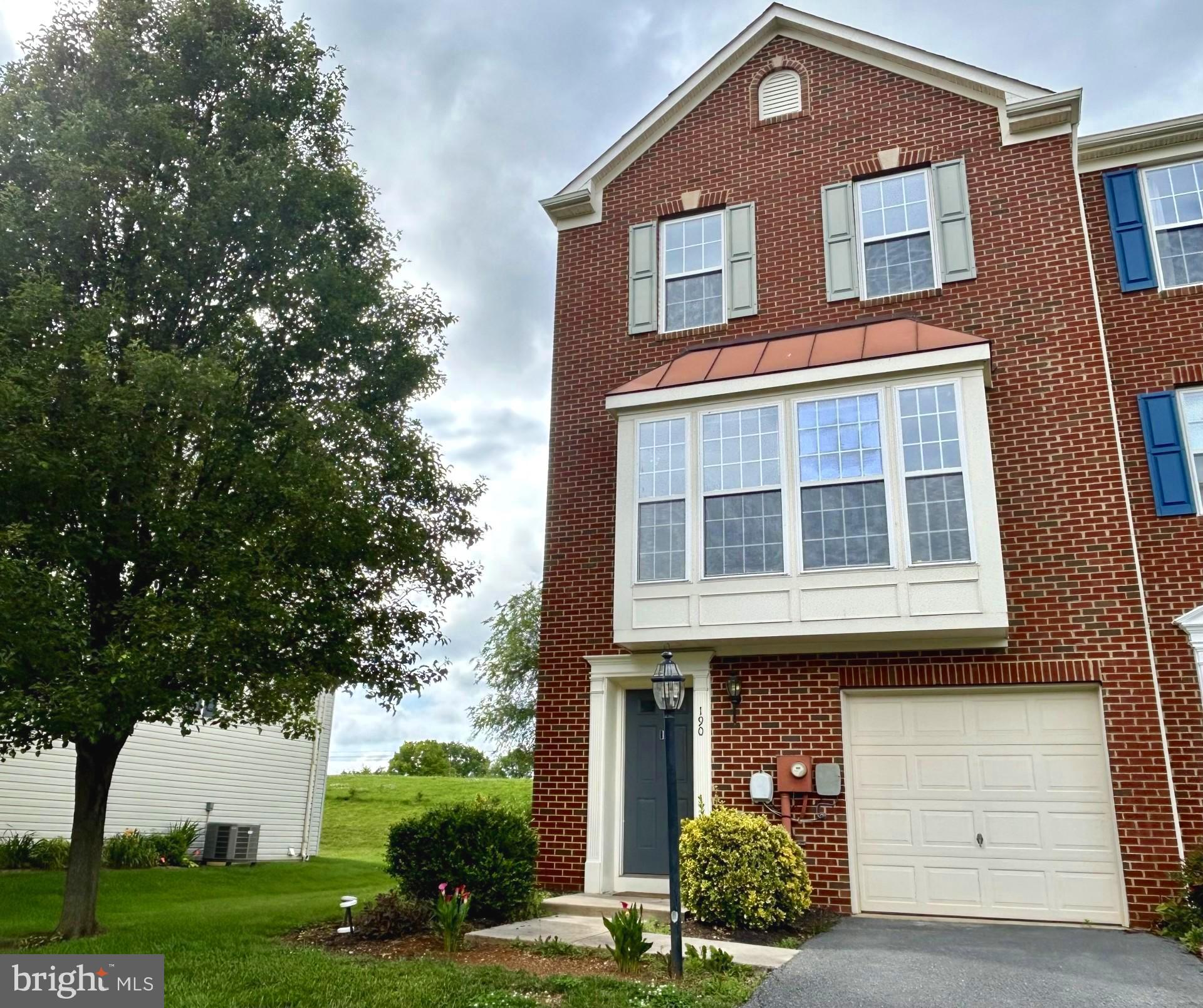 Welcome home to this spacious - almost 2,400 square feet - town home featuring new flooring and a popular layout. The entry level offers a wide-open space with so many possibilities, including a walk-out to the rear yard. On the main living area you will find an open but defined floor plan. The two living areas are spanned by an open kitchen with island and pantry. The large primary bedroom anchors the upper level with its en-suite bathroom and huge walk-in closet. You will also find two additional bedrooms and hall bathroom on this level. This home also boasts a garage, paved driveway, and is close to overflow parking area. All this conveniently located near shopping and commuter routes.