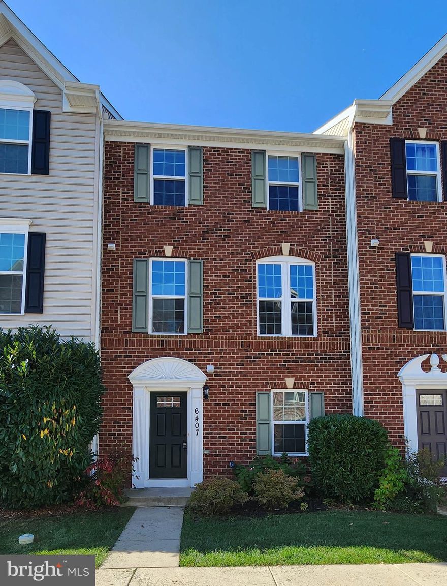 Welcome to this beautifully designed, three-story townhome boasting a classic brick façade, situated in an ideal location close to main commuting routes, premium shopping, and dining experiences. Main Level: Step into a generously-sized recreation room perfect for entertainment and relaxation. For those who've transitioned to remote work or need a personal space, the private office awaits. This versatile room also offers the flexibility to be transformed into a fourth bedroom depending on your needs. A pristine full bathroom is conveniently located on this floor. Doors lead out to a fenced rear yard where tranquility meets functionality. The maintenance-free deck invites you for outdoor relaxation. Mid Level: The elegance of hardwood flooring flows seamlessly throughout this level, complementing the sophisticated aesthetic of the home. Prepare your culinary delights in the gourmet kitchen, which showcases gleaming granite countertops, a spacious island, and state-of-the-art stainless steel appliances. The added luxury of gas cooking will surely delight the home chef. Enjoy meals in the adjoining dining area, which seamlessly merges with the family room, creating an inviting space for gatherings. A formal living room provides an additional area for hosting or unwinding. Upper Level: The sleeping quarters comprise three well-appointed bedrooms. The primary owner’s suite is a haven of luxury, featuring an attached private bathroom. Here, indulge in the deep soaking tub or refresh in the spacious stall shower, equipped with bench seating for added comfort. Two more bedrooms and an additional full bathroom complete this floor, ensuring ample space and privacy for all residents. This residence perfectly encapsulates modern comforts, chic design, and a prime location.