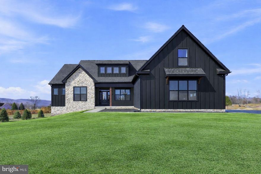 Delivery date 6/23/2026!!!!    This home will have Black Hardie board siding!   Enjoy the best of both worlds — peaceful country living with convenient access to everything you need. 

This new 1 +/- acre homesite is located in a new community that incorporates a desirable location and country feel!

Your new home will be a beautifully built Farmhouse ranch-style model designed with comfort and quality in mind. The open floor plan features vaulted ceilings, luxury vinyl plank flooring,  quartz countertops, and soft-close cabinets. The kitchen comes with a full appliance package so you're ready to cook and entertain from day one.

There's a full basement for storage, hobbies, or future living space. The home is thoughtfully laid out for easy, one-level living.  Price includes 1200 square feet of finished basement including full bath.

Outside, you’ll have room to enjoy — gardening, outdoor gatherings, or just soaking in the peaceful surroundings.  And while it feels like you're out in the country, you’re just minutes from local parks, schools, shopping, and other amenities.

Come settle in a place that offers comfort, space, and a true sense of home.

"Please note: The photos shown are of a similar completed home. The specific home may vary in floor plan, finishes, or upgrades. The builder reserves the right to substitute materials that may not be available to avoid delays."