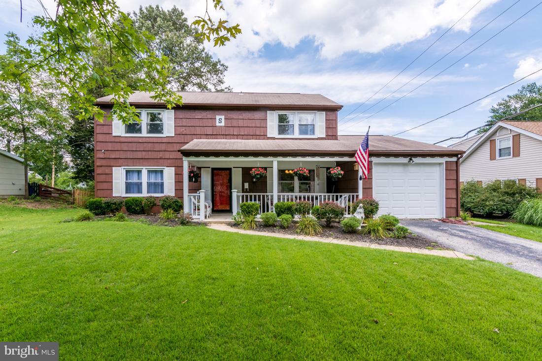 Put this Home on your "To View" List! Spacious & Bright Colonial! Contemporary Chef's Kitchen includes 42" White Cabinets, Granite, Recessed Lights, Hardwood floors, NEW SS Gas Stove, Fridge & Microwave. Newer Double-Paned Windows & Slider. Separate LR & DR. Updated baths. Large laundry & workroom. Enjoy sitting on Brick Patio & Front porch. 4 car driveway. Fenced Rear yd w/Shed. LOCATION!