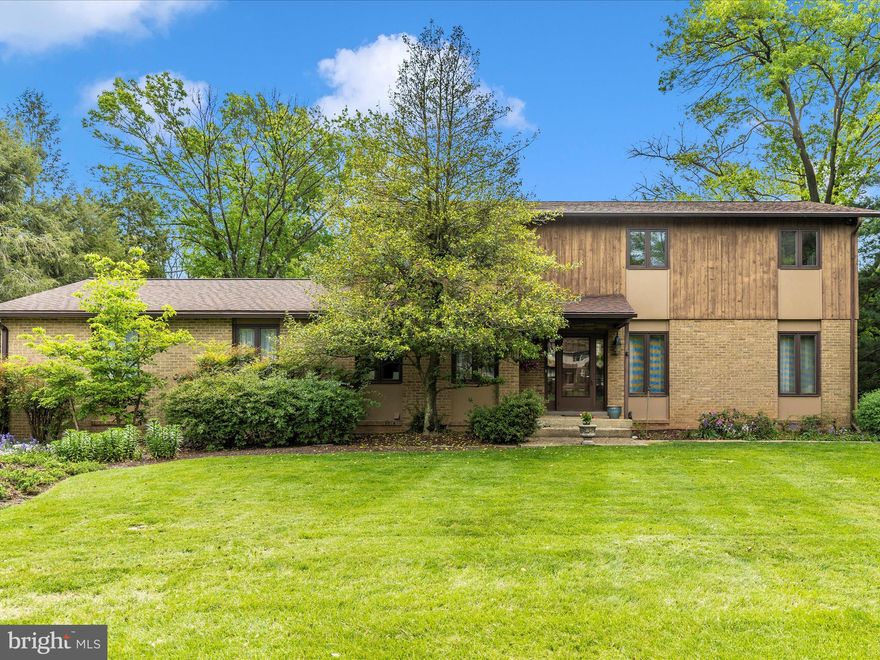 Spacious one-owner colonial in sought-after Clover Hill.    Welcome to this stunning 5 bedroom, 2.5 bath colonial nestled on a serene .98 acre lot in the heart of Clover Hill - a community known for its pool, park, ballfields and clubhouse, all with NO CITY TAXES!   This Ausherman built home has been lovingly maintained by its original owner and backs to mature trees for added privacy.   Inside, you will find hardwood floors throughout the main and upper levels, an inviting formal sunken living room, and a formal dining room perfect for entertaining.  The heart of the home is the open-concept kitchen and family room, featuring granite countertops, stainless steel appliances, and abundant natural light from the large windows throughout. Upstairs, all 5 spacious bedrooms are conveniently located on one level, including a luxurious primary suite with a walk in closet and private bath.   The main level laundry adds everyday convenience and the oversized 2 car side entry garage offers ample space.   The partially finished lower level features a huge L-shaped recreation room with a rough-in for a future half bath and a walk up exit to the expansive backyard.  Outdoors, enjoy your private oasis complete with a koi pond, waterfall, professional landscaping, large deck with retractable awning, massive patio - perfect for relaxing or hosting guests.   Major updates include:  a new roof in 2017, well pump in 2023, hot water heater in 2025.   This rare find offers privacy, space, and community amenities - all without city taxes..  Schedule your private tour today!