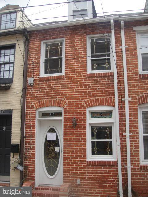1 bedroom with loft, wood pergo floors, exposed brick on livingroom and wall to upstairs.