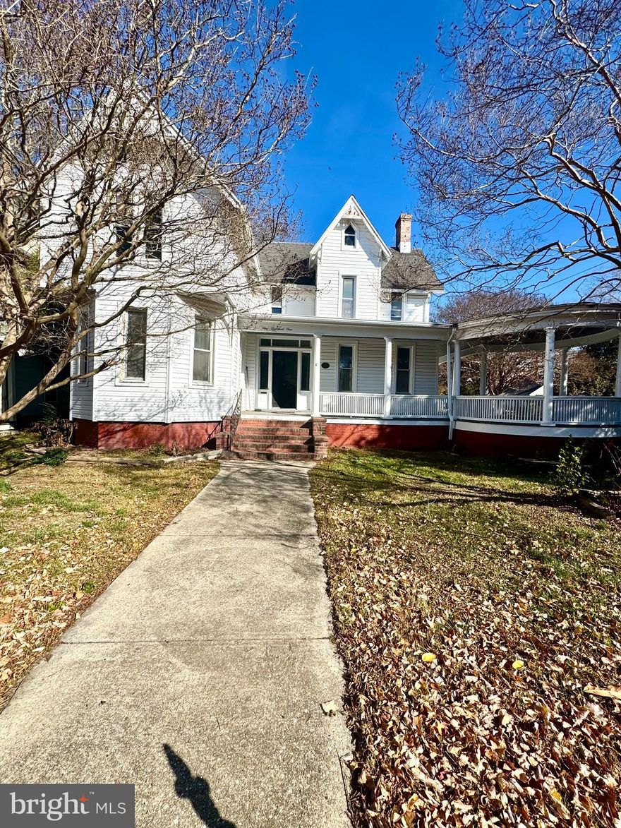 Now reduced.  Fantastic rental in Cambridge historic district.  Experience the charm and comfort of this over 2100 sq ft, 4-bedroom, 2.5-bathroom single-family home located in the heart of Cambridge close to restaurants and shops and just a short stroll to Long Wharf park and marina on the scenic Choptank River.  The well-appointed kitchen is complete with a center island with cooktop, double wall ovens, stainless steel appliances and granite counter tops.  There is a separate dining room with large windows bringing in an abundance of natural light. The downstairs also has a separate living room,  family room off the kitchen, half bath, laundry area and first floor bedroom which has accessibility to outside door without having to go through the main home.  Ascend the  beautiful wood staircase that leads  to the second floor bedrooms (3) and two full bathrooms. The primary bedroom has a full ensuite bath with separate shower and soaking tub. Enjoy the outdoors on the large porch with a wonderful circular architectural design.   Additional features include  off-street parking,  a separate laundry room, a coveted corner lot. and proximity to everything that makes Cambridge a desirable place to live.  Rent Spree application required for all tenants over the age 18.  First months rent and security deposit due at lease signing.  Minimum credit score 650 Pets considered on a case by case basis. 12 month lease.