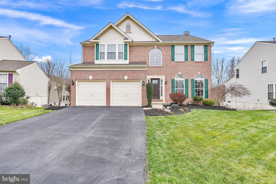 Gorgeous brick front colonial in desired community of Gunpowder. 
4 BR, 3.5 Bath,  2-car garage. Meticulously maintained by owner with many updates, freshly painted throughout, 2 story foyer takes you to the formal sitting room and formal dining room.  Features 9 ft. ceilings, eat in kitchen w/island, granite counters, recessed lighting, 42 inch maple cabinets, stainless appliances, new hardwoods floors. Bonus morning room with lots of natural lighting leads to 2-tiered deck which backs to woods. Large great room with beautiful 2 story stone stacked wood burning fireplace...amazing place to relax! Upper level features large primary bedroom with cathedral ceiling, large walk in closet, bathroom with double vanity, soaking tub and shower. Fully finished lower level features another full bath, wet bar, home theater room, gas fireplace, with basement walk out to patio and fenced in yard...perfect for entertaining guests! Newer roof & hot water tank. Don't miss out!