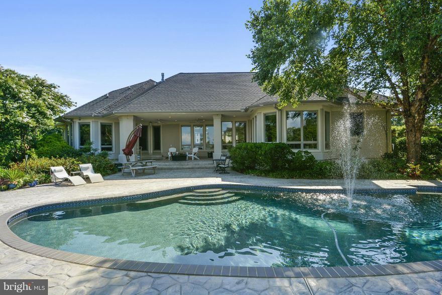 You'll be awed by this spectacular privacy setting, evening sunsets western exposures on cox creek. Have a fun lifestyle on the water, or entertain family & friends by the beautiful pool, veranda or fire pit. The home is built solid, all one floor living with so many up-grades & well thought out details through-out.(Pier can be installed) Close to shopping, church & bay bridge.