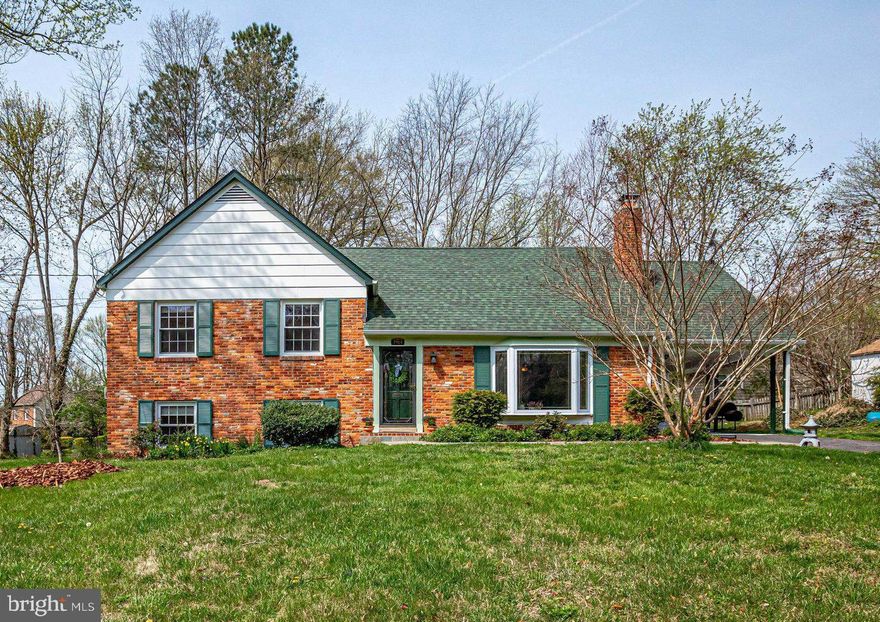 Lovingly maintained, spacious home in an awesome neighborhood, ready for you to move in! All top three levels of the home boast freshly refinished hardwood floors, and brand new carpet in the lower level rec room. Elegant, French-country-white kitchen with stainless steel appliances (refrigerator & dishwasher 2019, microwave 2020) opens up to breezy dining room that looks out on the spacious deck — ready for grilling and socializing — and also has the convenient side entrance from the carport. Three bedrooms and an updated bath make up the third floor and a huge primary bedroom with updated bathroom fill the fourth level. Attic access for more storage (or possible future conversion) is just off the primary bedroom landing. On the main level in the large front living room there is a cozy, wood-burning fireplace that the current owners have enjoyed very much. The lower level has a tv / rec room full of sunny windows, a half bath, and the laundry / utility area has access to the backyard through the rear door. Storage abounds with the large shed in the yard and another off of the carport! Roof (2019). Hot water heater (2017). Furnace/HVAC (2010) -- just inspected and given a clean bill of health. Just around the corner is Sherwood Hall library, a rain garden area and a farmer’s market that appears every Wednesday in season. Mt. Vernon Hospital, Costco, many restaurants, grocery and goods options are within close proximity off of Fort Hunt Road and Richmond Highway. Biking and jogging trails abound — most notably the one running parallel to the Potomac River and GW Parkway down to Mt. Vernon Estate. Easy commute to Fort Belvoir, Old Town Alexandria, Pentagon, National Landing, Reagan National Airport, DC.