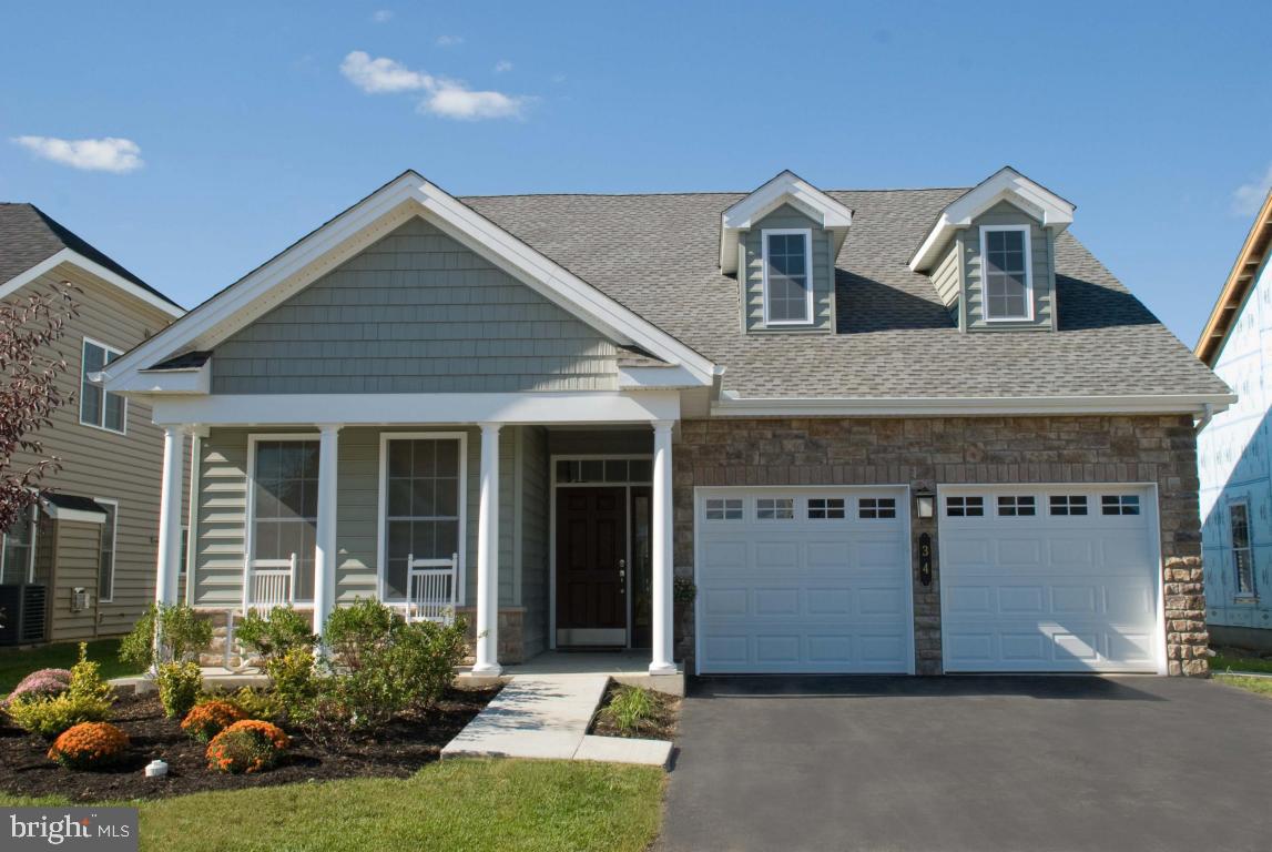 Model photos. If you build the BETSY ROSS II at Traditions of America at Lititz 55+ Community, it features 2 beds/2 baths w/2nd fl loft, 3rd bed/bath. 1st fl Master Suite. Designer kitchen. Magnificent Clubhouse! I-G pool, massage, fitness & billiard rooms. 9' ceilings, landscaping package, patio/deck, 2 car garage w/opener. Delivery 180 days. Custom program avail. Open Daily 10AM to 6PM