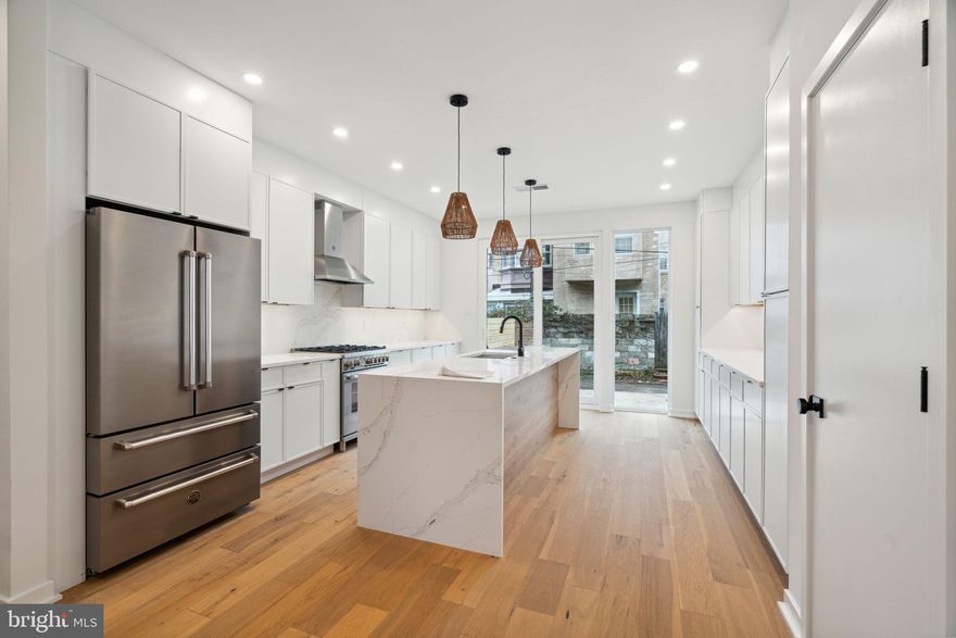 Welcome to 2237 Catharine Street! This 4 bedroom, 3.5 bathroom home resides in the heart of Graduate Hospital. This exceptional residence offers the epitome of city living. This home features tons of natural light and a stunning rooftop deck with skyline views for the ultimate urban escape. Enjoy breathtaking sunsets, entertain friends, or simply relish in the serenity of city living from your private oasis. The interior of this home is adorned with high-end finishes throughout. From elegant hardwood floors to designer fixtures, every aspect exudes luxury and sophistication. The open layout of this home maximizes the flow of light, making the living spaces feel bright and welcoming. Parking in the city is a breeze with the convenience of a rear parking spot. Situated in the heart of Graduate Hospital, you'll find yourself just a short walk away from beloved local hotspots like Ultimo Coffee, Sidecar Bar & Grille, and Loco Pez. With spacious bedrooms, a gourmet kitchen, modern bathrooms, and a finished basement, 2237 Catharine Street truly has it all.