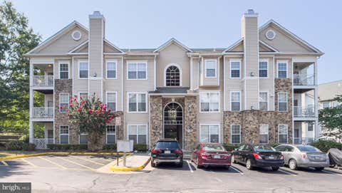 Photo of 5921 Founders Crossing Court #102, ALEXANDRIA, VA 22310 (MLS # VAFX2328470)
