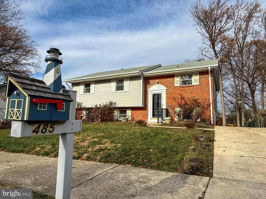 Welcome home to this beautifully updated 4-bedroom, 2-bath split foyer in the popular Olde Mill community. From the moment you step inside, you’ll appreciate the fresh, warm feel of thoughtful renovations throughout. The main level features refinished oak hardwood floors that add charm and character, while the kitchen and lower level shine with brand-new luxury vinyl plank flooring. The kitchen is a true highlight, offering all-new cabinets, countertops, flooring, sink, faucet, gas stove, and microwave. The existing stainless steel refrigerator and dishwasher are newer as well, making the entire space feel modern and move-in ready. The main level hosts three spacious bedrooms and a renovated full bath. The living and dining rooms flow seamlessly together and lead to the composite deck and screened porch—perfect for relaxing or entertaining. Fresh paint throughout gives every finished space a crisp, inviting look. The lower level adds wonderful flexibility with a newly created fourth bedroom, a cozy family room with a gas fireplace (“as is”, because it hasn't been used in years), and sliders that open to the patio and mostly fenced backyard. You’ll also find a renovated full bath, a dedicated office with built-in shelving, and two utility/storage rooms—one housing the laundry. Outside, this home continues to impress with multiple areas designed for gathering and enjoying the outdoors. The upper deck and screened porch offer great spots for morning coffee or evening dinners, while the lower patio features a built-in brick grilling area. A convenient shed provides plenty of room for tools, toys, and yard games. This lovingly updated home is nearly ready for its debut—and it’s one you won’t want to miss!