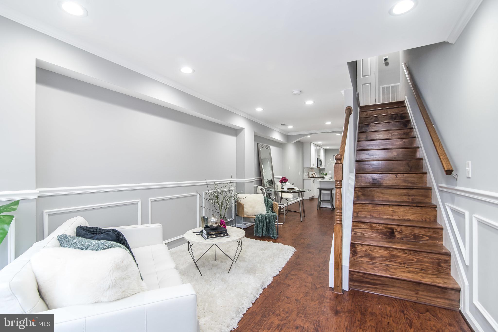 GORGEOUS RENOVATION IN HISTORIC FELLS POINT! THIS STUNNING 3BR/2.5BA 3 LEVEL ROWHOME HAS EVERYTHING YOU'RE LOOKING FOR. BRAND NEW GOURMET KITCHEN W/ S/S APPLS & QUARTZ COUNTER TOPS. HEATED FLOORS ON 1ST LEVEL!! SECOND FLOOR LAUNDRY ROOM. THIRD FLOOR MASTER SUITE WITH LUXURY BATH W/ WHIRLPOOL TUB! PORCH OFF OF MASTER SUITE LEADS TO ROOFTOP DECK W/ STUNNING VIEWS OF FELLS POINT AND WATER!