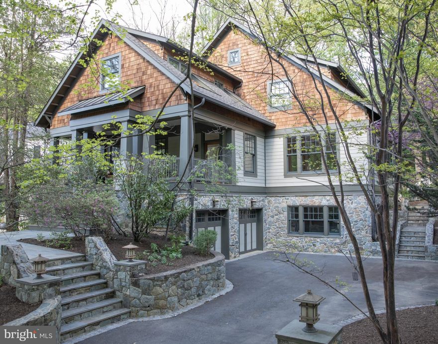 Gorgeous Craftsman-inspired Morris-Day home available in highly sought-after Franklin Forest/Franklin Park. Designed as a new build by locally acclaimed architects Rob Morris and Dwight McNeil to meet the owners’ twin desires for family living and bringing the outdoors in, every detail has been thoughtfully planned from the banks of windows on every side of the house to custom toy closets. The heart of this three-level home is the south-west facing gourmet kitchen with eat-in island, two sinks, two dishwashers, and Wolf/SubZero/Bosch appliances. Twin sets of French doors in the dining room swing open to invite al fresco dining in the screened-in back porch. Enjoy uninterrupted views of mature trees in the fully wooded lot as you sit by the stone wood-burning fireplace in the family room. A lovely columned living room leads to a large private office with built-in desk, bookshelves, and filing cabinets.

Upstairs features the 14’ cathedral ceiling master bedroom with walk-in closet and oversized limestone master shower, two large bedrooms with Jack and Jill bathroom, guest room with ensuite bathroom, and laundry room with sink and wall of wood cabinets. The sunlit recreation room with built-in entertainment center and surround sound speakers is the star of the walk out level side of the basement with large southern and western windows. A spacious fifth bedroom (currently used as an exercise room) with large windows on the daylight basement side, full bathroom, mudroom, and utility/storage room complete this level.

Bespoke finishes typical in Morris-Day homes include extensive moulding and wainscoating, built-ins, pin and art lights. Oak flooring, 7’ solid wood doors, and high ceilings (ground - 9’; main - 10'; upstairs - 8 1/2’) were specified throughout all three levels. First floor stereo system extends into the screened-in porch. Inspired by the natural beauty of its surroundings, the home features 59 double-pane, over-sized Marvin windows. A 29' covered front porch with treetop views and the 17’ screened-in porch both feature Trex flooring and create an additional 478 sq feet of living space. The Carderock back patio, stairs, footpaths, and stone walls were designed by Gardenwise Landscaping.

One of the few lots with no neighbor behind it, the property extends from Franklin Avenue to Virginia Avenue.