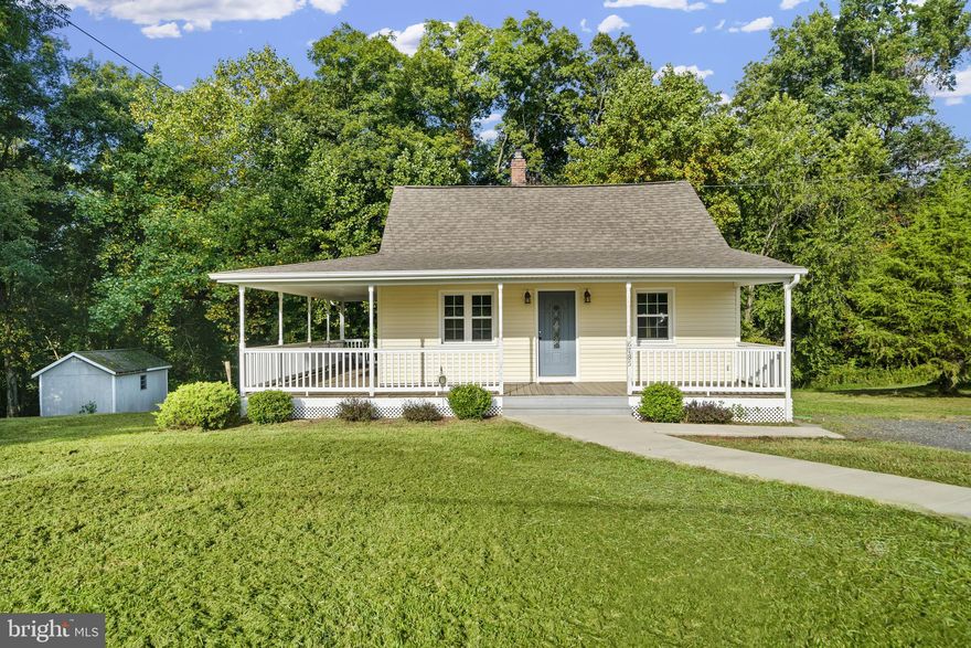 Fall in love with this Cozy Cape Cod on 5+ acres. Kitchen and bathrooms have been updated. Enjoy your morning coffee on the wrap around  porch or evenings by the fire pit. Original hardwood flooring gives this home lots of character. This is an Estate sale Home being sold AS-IS