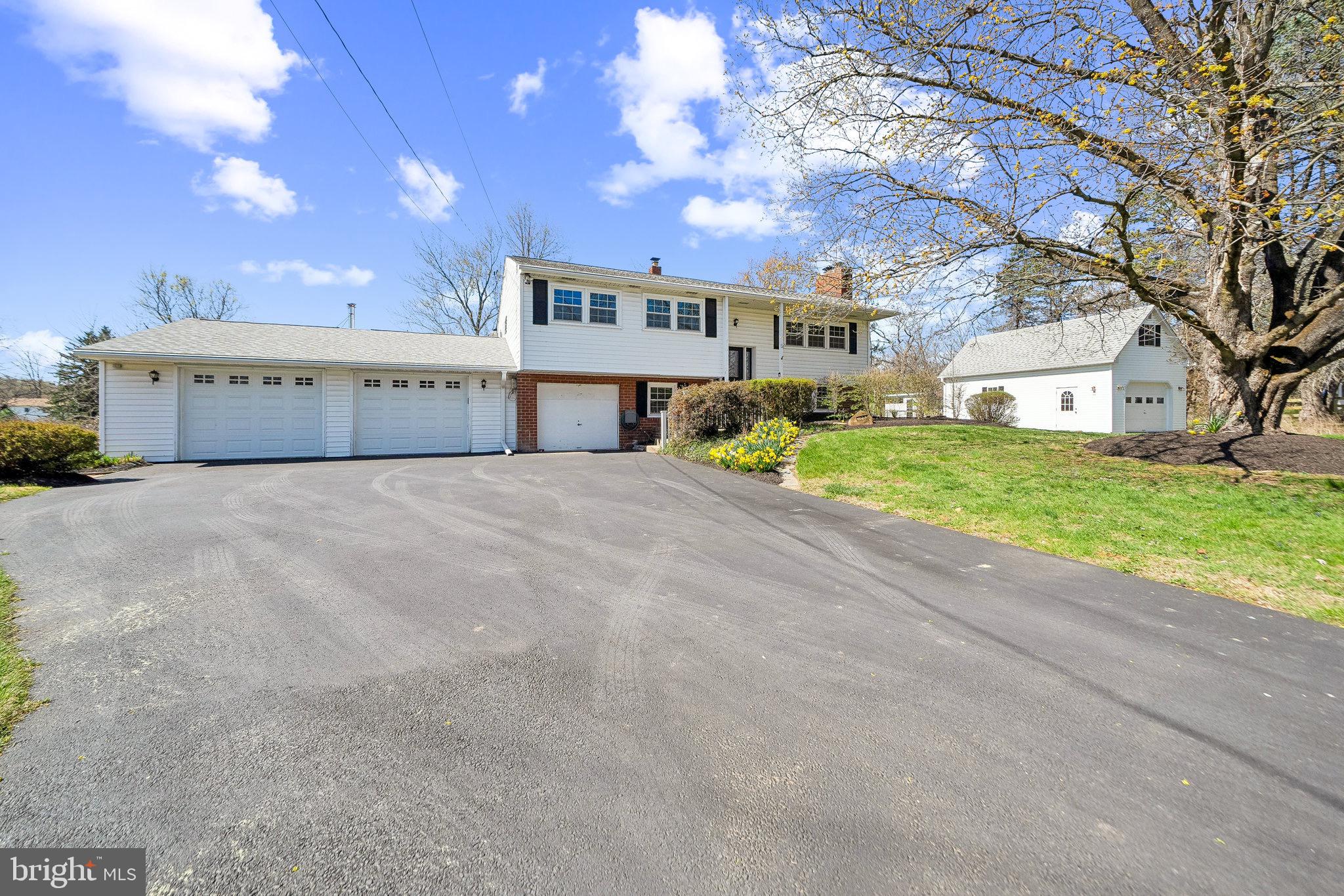 WE HAVE RECEIVED MULTIPLE OFFERS. PLEASE HAVE ALL OFFERS SUBMITTED BY 5pm ON MONDAY, APRIL 14th. Tucked away on a quiet cul-de-sac in Sought- after Phoenixville, this 4-bedroom, 3.5-bath, 2,692 SF Split level home offers a rare combination of privacy, charm, and flexible living spaces — all backing up to 24 acres of preserved green pasture. That’s right… no one can ever build behind the property.
Step Inside and you’ll find original parquet hardwood floors and sunlit living spaces that flow effortlessly for both everyday living and entertaining. Upstairs you will find the living room, Dining Room, kitchen, 3 bedrooms and 2 full baths. The primary suite is a true retreat, featuring an ensuite bathroom, plenty of closet space and a bonus sun-drenched room with sweeping views of the back yard greenery. Use this versatile space as a cozy sitting room, private office, or make it your bedroom to wake up every day to a stunning view. You will also find two additional well-sized bedrooms and a full bath, offering the ideal layout for family or guests.
Head down the hall to the Living room, dining room and spacious kitchen that opens directly to a brand-new Trex deck—ideal for gatherings or quiet mornings overlooking your private retreat. It is perfect for morning coffee or al fresco dining. Downstairs you will find two flex rooms that could be a den, office or bedroom, a ½ bath and the laundry room. The thoughtfully designed layout includes an addition offering a 4th bedroom with a private entrance and full bath, ideal for an in-law suite, guest quarters, or even a dedicated home office.
Your backyard oasis awaits with an amazing in-ground pool, complete with a cabana and convenient outdoor shower—perfect for entertaining or unwinding on hot summer days. There is also an additional shed for all those lawn care needs, and additional storage under the deck.
Looking for even more space? The two-story barn offers endless possibilities. Whether you envision a future guest house or rental property (variance required), a kids’ hangout, studio, or an inspiring work-from-home space, this versatile structure is ready for your creative touch.
Additional features include a 3-car garage, a newer roof and windows, and the peace and privacy of a truly special setting—all just minutes from downtown Phoenixville's shops, dining, and vibrant community events. Don't miss this rare opportunity to own a slice of tranquility with modern comforts and room to grow. The possibilities are endless here.
WE HAVE RECEIVED MULTIPLE OFFERS. PLEASE HAVE ALL OFFERS SUBMITTED BY 5pm ON MONDAY, APRIL 14th.