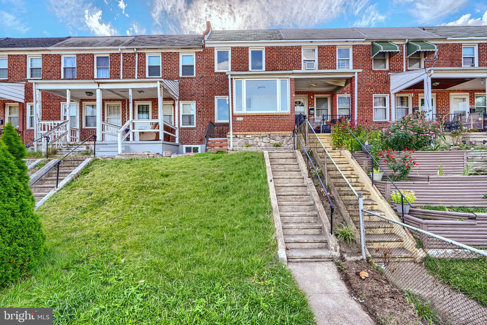 If you are looking for a home brimming with character in the heart of a growing community priced under $200,000, then 334 Kane St is for you! Featuring an open floor plan, original hardwood floors, a finished basement and off street parking, this home is one of the best values in Baltimore! Buyers are greeted by a covered porch, which is perfect for relaxing on summer nights or could easily be converted into a mudroom. The living room is spacious and offers plenty of room for entertaining family and friends and flows nicely into the kitchen, which is equipped with granite countertops, brand new stainless steel appliances and plenty of storage space. Upstairs offers two spacious bedrooms, each with unique details! The front bedrooms showcases exposed beams and soaring ceilings; while the rear bedrooms offers a unique accent wall. Plus, there is a shared bathroom with a shower/tub combo. The finished basement is perfect for an additional living space, office, storage or use as a third bedroom. The basement also has a second full bathroom, laundry and a bonus storage room. The home is serviced by central AC and recently updated utilities. Plus, you'll never have to worry about parking again with your private parking pad. You'll be hard pressed to find a better home for the price than this one!