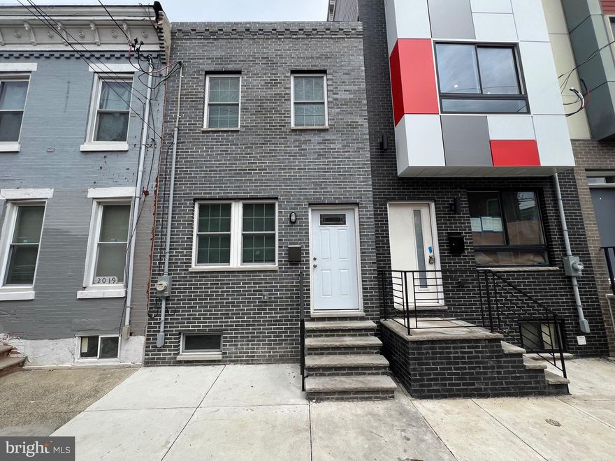 Welcome to 2017 Watkins Street, a beautifully renovated home located in the highly sought-after Point Breeze section of the city. This stunning property features new hardwood flooring throughout, an open-concept layout, and a modern kitchen complete with a central island—perfect for entertaining. Upstairs, you’ll find two spacious bedrooms, each with large closets, and a sleek staircase that adds a touch of contemporary flair. The classic brick façade gives this home timeless curb appeal. Currently tenant-occupied on a month-to-month lease at $1,800/month, this is a great opportunity for both investors and owner-occupants alike. Whether you’re looking to expand your portfolio or find your next home, this property checks all the boxes.