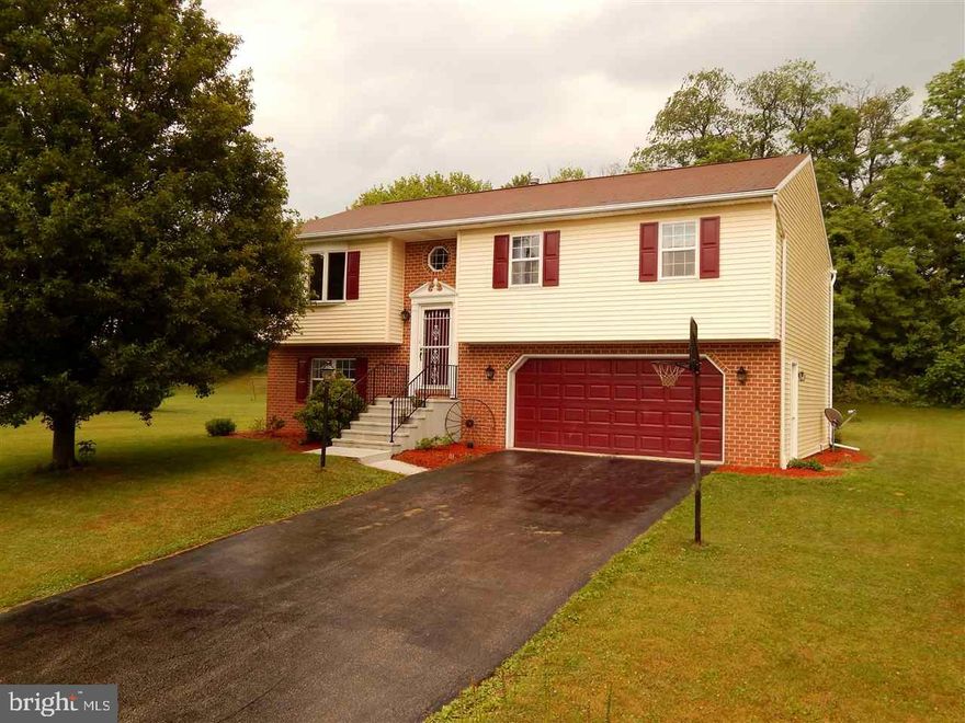 Very nice 3 BR, 2.5 BA on cul-de-sac in Dallastown schools. Above ground pool. Fully finished walk-out basement with gas fireplace. Two tier deck, new carpet through-out, central a/c, finished 2-car garage, Big level lot. Worry free home on quiet, no through traffic street.