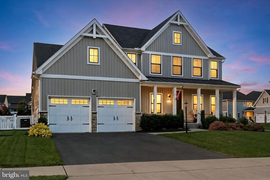 Welcome to 2511 Owl Roost Court, a beautifully crafted 4-bedroom, 4-bathroom Craftsman-style home located in the sought-after Kellerton community of Frederick, Maryland. Built in 2021 and situated on a corner lot, this 3,828 sq ft residence offers a thoughtfully designed layout with 10-foot ceilings, a gourmet kitchen featuring leathered granite countertops and stainless steel appliances, a main-level owner’s suite with dual walk-in closets and a spa-like bath, and a bright, open-concept living area anchored by a double-sided fireplace. The upper level includes a spacious loft, three additional bedrooms, and a full bath, while the fully finished basement adds even more living space with a half bath and flexible recreational areas.
Outdoor living is equally impressive with a covered patio (complete with ceiling fan and outdoor fireplace), a fully fenced backyard with privacy trees, and scenic views of the adjacent reserve. The home includes a two-car garage and access to a range of community amenities like a clubhouse, pool, dog park, athletic fields, and walking trails—all with a low HOA fee. Zoned to Whittier Elementary, West Frederick Middle, and Frederick High, and offering quick access to commuter routes and local shopping, this home blends upscale comfort with everyday convenience.