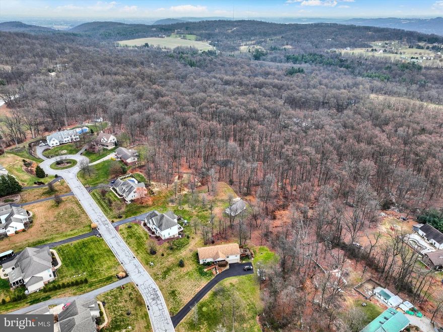 Beautiful 3.41± acre wooded lot located in the highly sought-after Eastern School District. Nestled within Watershed Estates, this property offers a peaceful, private setting surrounded by nature while still being conveniently close to town. Ideal for a custom-built home, the gently wooded landscape provides natural beauty, privacy, and abundant wildlife. Enjoy country living with the benefits of an established community. A rare opportunity to own acreage in a desirable location—bring your builder and envision your dream home today.