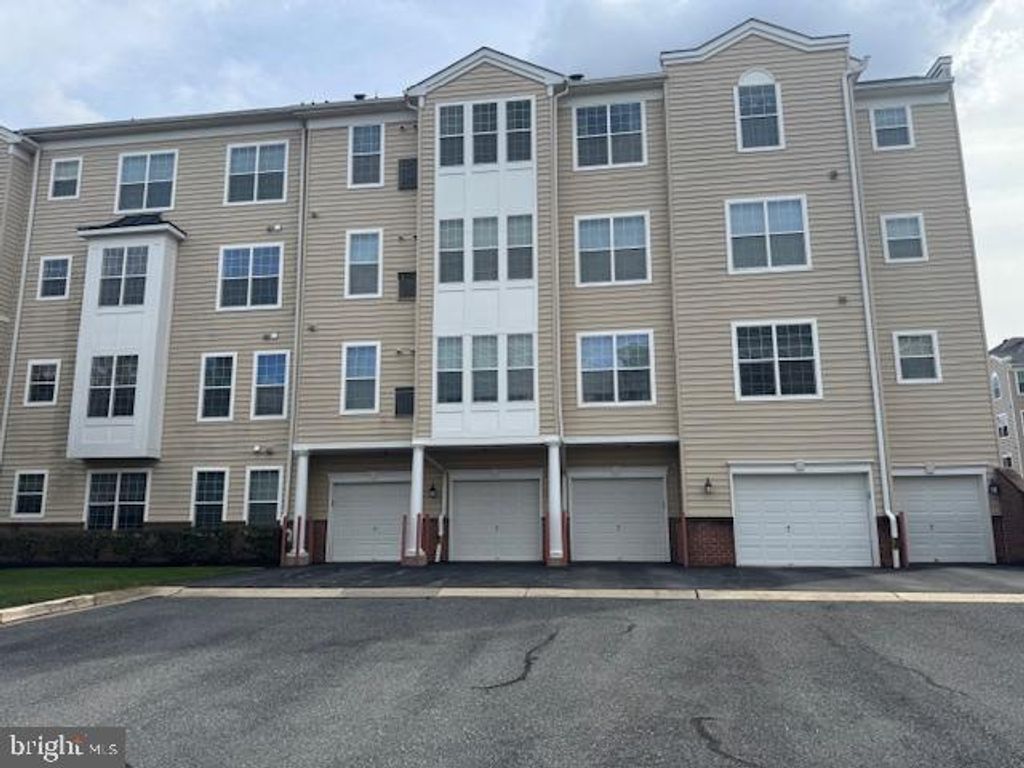 Photo of 8612 Fluttering Leaf Trail #203, ODENTON, MD 21113 (MLS # MDAA2129840)