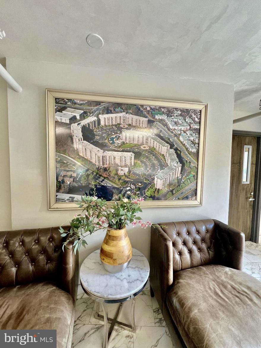 Welcome home to your cozy 9th floor unit in building 1 of the gated Rotonda community.  Unit is in the popular model F floor plan with 1,132 sq. ft.  It has 2 bedrooms and 2 full bathrooms.  Unit 917 features updated bathrooms and kitchen, and upgraded carpets.  Its enclosed balcony with south-westerly views assures your year-round enjoyment of the sunsets and view.  Building 1 (8350 Greensboro Drive) has the wondferfully equipped recreation center located directly underneath - This allows you the easiest year-round access; no need to step outside the building in difficult weather.  Rotonda condominium is awash with amenities both indoor and outdoor.  The community is across the street from The Boro that has Wholefoods, restaurants and other amenities.  Greensboro metro rail station on the silver metro rail line is less than 0.3 miles.  Enjoy easy access to Reston, Dulles, IAD to the west and to Washington DC to the east.