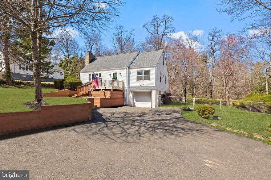 You cannot beat the location of this delightful home, nestled on a quiet street in Yardley Borough and backing to a serene tree lined yard, offering the perfect blend of privacy and convenience. Sitting gracefully on a hill, this picturesque expanded Cape Cod welcomes you with a hardscaped stairway leading to the front door.

Step inside to a warm and inviting living room featuring gleaming hardwood floors, cozy fireplace, and stunning custom built-ins. The spacious eat-in kitchen offers ample cabinet and counter space, with direct access to the basement and garage, perfect for easy grocery drop-offs on rainy or snowy days.

The main level includes three bedrooms and a full bath, while the upper level boasts a versatile space that can serve as a large bedroom, bonus room, or creative retreat. With access to two separate storage areas, there's potential to add an additional bedroom, bathroom, or even a dream walk-in closet.

Surrounding the home is an expansive yard, partially fenced for pets or play, with endless possibilities for landscaping to enhance its natural beauty. The unfinished basement provides plenty of storage, laundry space, and a half-bath (currently disconnected), making it ideal for a workshop or future finishing.
Check out the sellers disclosure for some upgrades such as a brand new roof this month with a 25 year transferable warranty; upgraded plumbing and electrical throughout the house and more.

Enjoy the best of Yardley living with a short scenic walk to the historic Delaware Canal, charming boutiques, and popular restaurants. Commuters will love the easy access to I-295, major train stations, and airports, connecting you effortlessly to NJ, NYC, and Philadelphia. Plus, this home is located within the award-winning Pennsbury School District!

Note: The owner has extensive architectural drawings to expand this home in the future that will be offered with the transfer of ownership.