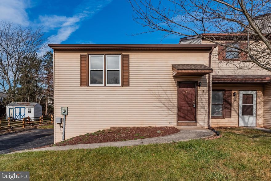 Welcome to this 2 BR  and 2 Full Bath end unit townhome w/side entry one car garage offering over 1350 sqft of living space.  Upper level offers an open floor plan with updated kitchen with granite countertops opening to the living room. Spacious living room leads to a covered deck w/stairs to the patio below.  Main level has  one bedroom, full bath. The lower level offers family room, half bath and a second bedroom. Wonderful rear yard and plenty of off street parking, community swimming pool and amenities. Call today for your personal showing.