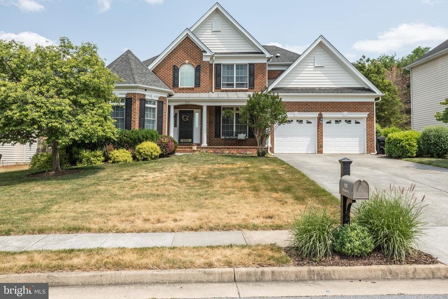 Welcome to this exquisite home on a peaceful cul-de-sac in the city limits. As you enter this home, you'll be greeted by beautiful hardwood floors throughout the main and upper levels. The main floor primary suite offers a spacious retreat with a luxurious ensuite bathroom complete with double vanities, soaking tub, walk-in shower and large walk-in closet. The arched windows surrounding the stunning stone gas fireplace in the two story family room creates a warm and inviting atmosphere. The formal living and dining rooms provide space for hosting family and guests. The gourmet kitchen has granite counters, stainless steel appliances and pantry. The two additional bedrooms and a jack-n-jill bathroom on the upper level provide additional space for family and guests. The lower level offers a  4th bedroom and a full bath with double vanities and walk-in shower. Step outside to the paver patio with views of mature trees and fully fenced landscaped backyard, creating a serene outdoor oasis. Perfect location near shops, dining options, and schools. Don't miss your opportunity to own this gem. Schedule your showing today.