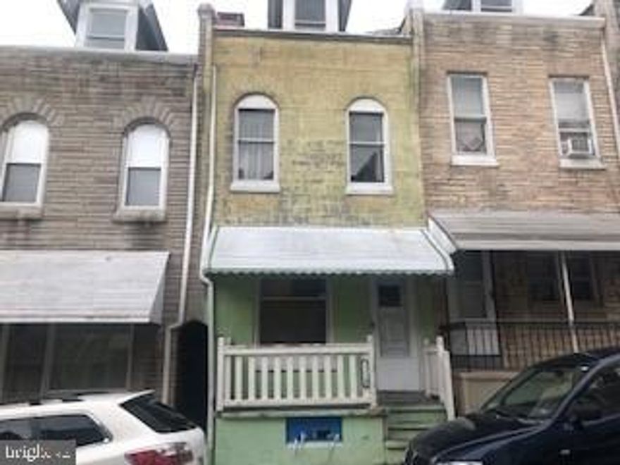 Row in Northeast section of Reading. Property is being sold in as is condition.