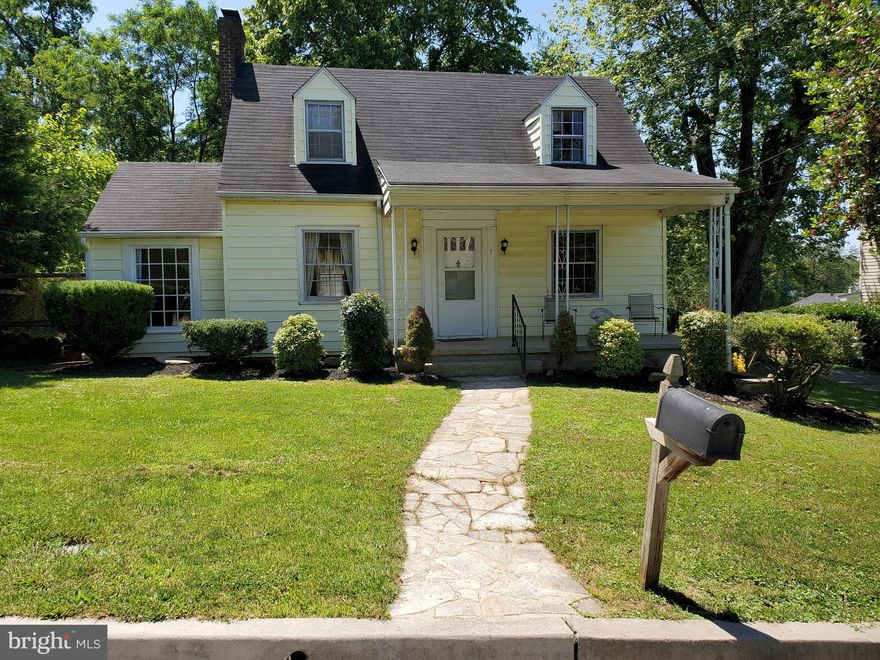 Lovely and nicely expanded cape cod with covered front porch on a landscaped .36 acre level lot. The current owner's many valuable improvements over the last 7 years include entire roof replacement,  professional finishing of entire lower level adding a 4th BR and full bath, conversion from oil to natural gas heat, installation of combi-boiler/tankless water heater, addition of central AC and heat/air mini-splits, replacement of main water line from street to house, electrical upgrade to 200 amp service, and replacement of garage door opener. The Property is offered AS IS, but subject to buyer's satisfaction with any and all inspections undertaken. Situated on a quiet non-through street, this home just awaits your personal finishing touches and comfortable enjoyment for many years to come. Great public schools and so convenient to I-83, NCR Trail, and Hunt Valley Mall. Don't delay!! Interior photos to follow after Seller move out.