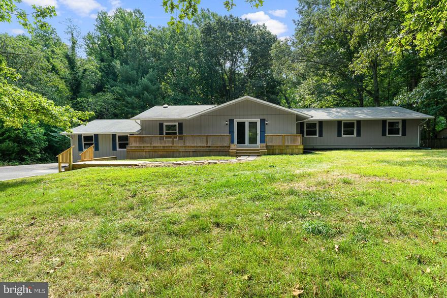 Beautiful open floor plan ranch style home, move in ready! Front deck redone, fresh exterior paint, large back deck that was just refinished and stained. Stainless appliances, open kitchen/dining/living space. Newer granite countertops. Beautiful laminate wood floors and exposed wooden beams in front room. 3 bedrooms and 2 full baths. 2 additional rooms off of the dining room that could be used as office space, playrooms etc. 2 car garage with a separate storage shed. Septic inspection was already performed to save the buyers money! This is a great property!