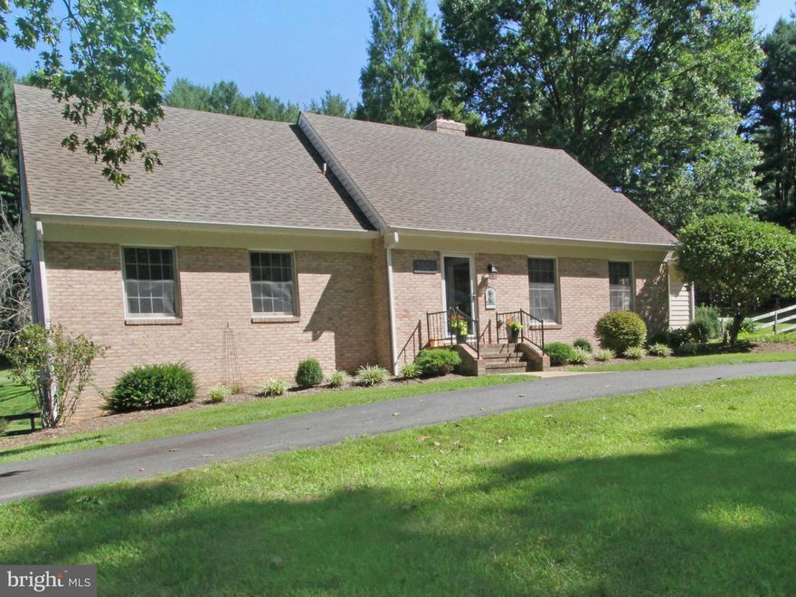 This is the WOW house Home has been completely updated throughout including kitchen floors bathrooms roof & siding.  The home overlooks beautiful vistas and is situated in a private but convenient location. Floors are on site finished oak flooring on the main level and bamboo flooring in master All bathrooms and major appliances have also been updated Put this at the top of your list of homes!!