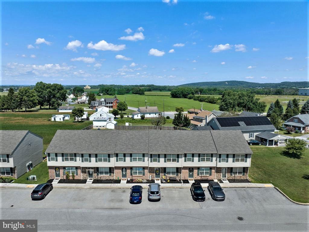 AN ALMOST NEW, 18 UNIT TOWNHOUSE COMPLEX BUILT IN 2017. THERE ARE 3 SEPARATE BUILDINGS, EACH WITH 6 TOWNSHOUSES. THE TOWNHOUSE HAS A KITCHEN / DINING ROOM, LIVING ROOM, UTILITY / LAUNDRY ROOM AND HALF BATH ON THE MAIN FLOOR AND 3 BEDROOMS AND 2 FULL BATHS ON SECOND FLOOR. IN ADDITION, THEY EACH HAVE AN ATTACHED STORAGE ROOM, SMALL DECK OR CONCRETE PATIO, ECONOMICAL GAS FHA HEATING AND CENTRAL AIR CONDITIONING WITH 2 CAR ASSISGNED PARKING PER UNIT AND 12 EXTRA VISITOR PARKING SPOTS. EACH TOWNHOUSE HAS SEPARATE WATER & SEWER AND TENANTS PAY ALL UTILITIES INCLUDING TRASH, WHICH IS PRORATED AMONG THE TENANTS. OWNER PAYS PROPERTY TAXES AND INSURANCE. ALL RENTS NEED TO BE ADJUSTED.