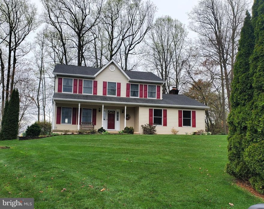 Welcome to this charming porch-front Colonial that offers timeless appeal with the opportunity to add your own personal touches. The gleaming hardwood floors on the main level enhance the home’s classic style, while the formal living room with crown molding and the formal dining room featuring both chair and crown molding provide perfect spaces for more intimate gatherings. The eat-in kitchen boasts updated countertops and cabinets, a stylish tile backsplash, stainless steel gas stove and microwave, an island, pantry, and recessed lighting. The spacious, cozy family room, located just off the kitchen, offers a seamless flow for both daily living and entertaining. With a wood-burning fireplace as the centerpiece, it creates a warm and inviting atmosphere. The open layout is ideal for hosting guests, and easy access to the deck with an awning makes indoor-outdoor living effortless. Whether you're enjoying a quiet evening or entertaining friends, this space is perfect for gathering. The main level is completed by a convenient laundry room with access to the attached two-car garage, along with a powder room. Upstairs, enter the primary bedroom through double French doors where you’ll find a generous walk-in closet and a private primary bath featuring a Jacuzzi soaking tub, separate shower, and double sink vanity. Three additional well-sized bedrooms and a full hall bath complete the upper level, all offering great potential to be customized to your taste. The basement provides additional living space with a recreation room, a half bath, and an unfinished room with attached shelving — perfect for extra storage. A walk-up level to the backyard adds easy access to the outdoors, where you’ll find a beautifully landscaped lot with mature trees, as well as a storage shed for your lawn tools and equipment. The attached side-entry garage and the large driveway offer ample parking. While the home is move-in ready, it’s in need of a few updates, offering you the perfect opportunity to bring your vision and personal touches to make it your own. Recent updates include a new roof, gutter, & downspouts (2015), a new hot water heater (2019), and a new driveway (2021). The community offers wonderful amenities, including a pond, basketball court, tennis court, playground, and picnic area — with trash pickup included in the HOA fee. Great location! Close to major routes, shopping centers, medical facilities, parks, restaurants, and charming downtown Sykesville.
WELCOME HOME!!